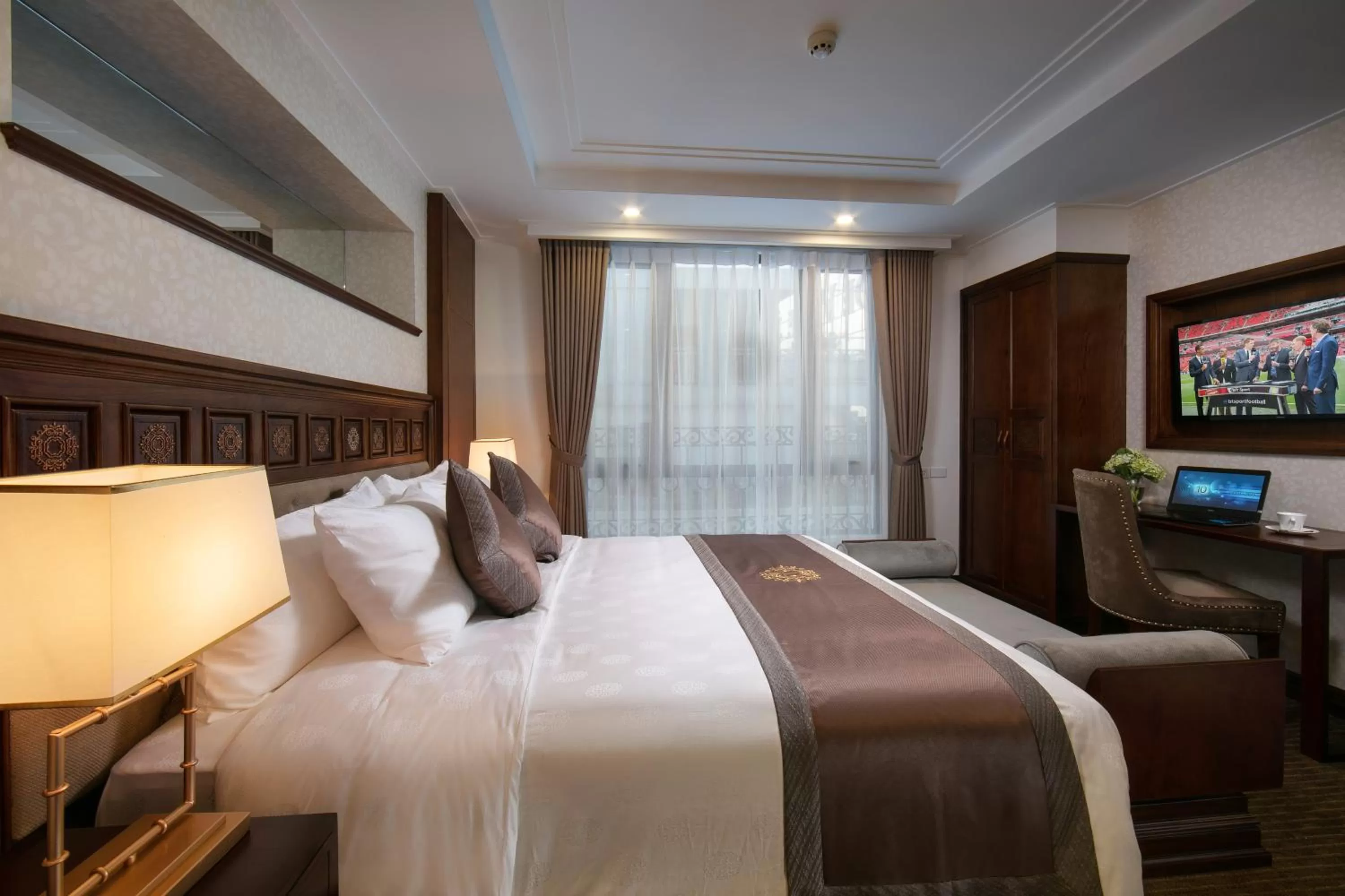 Bed in Rex Hanoi Hotel