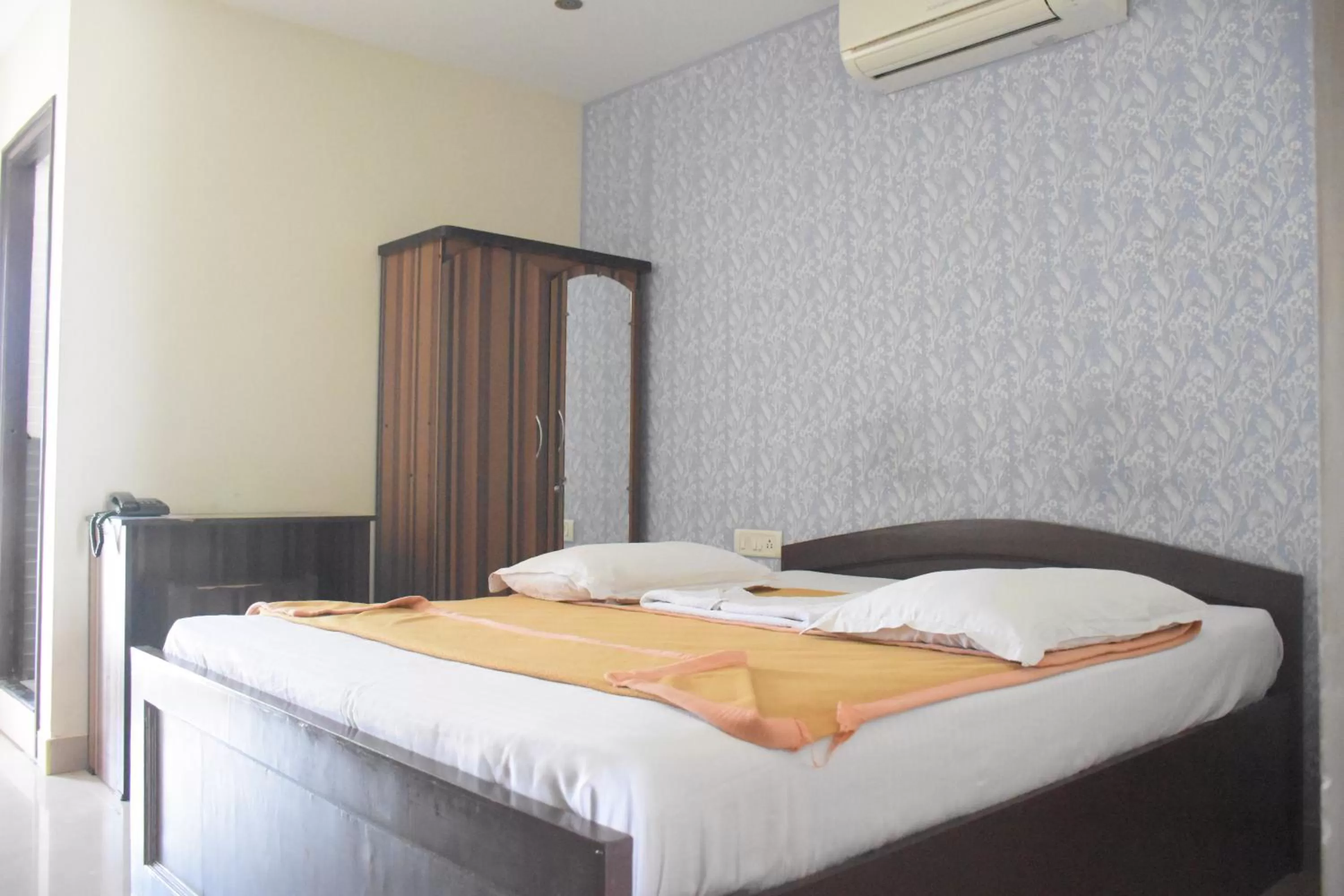 Bed in Star MSR Residency