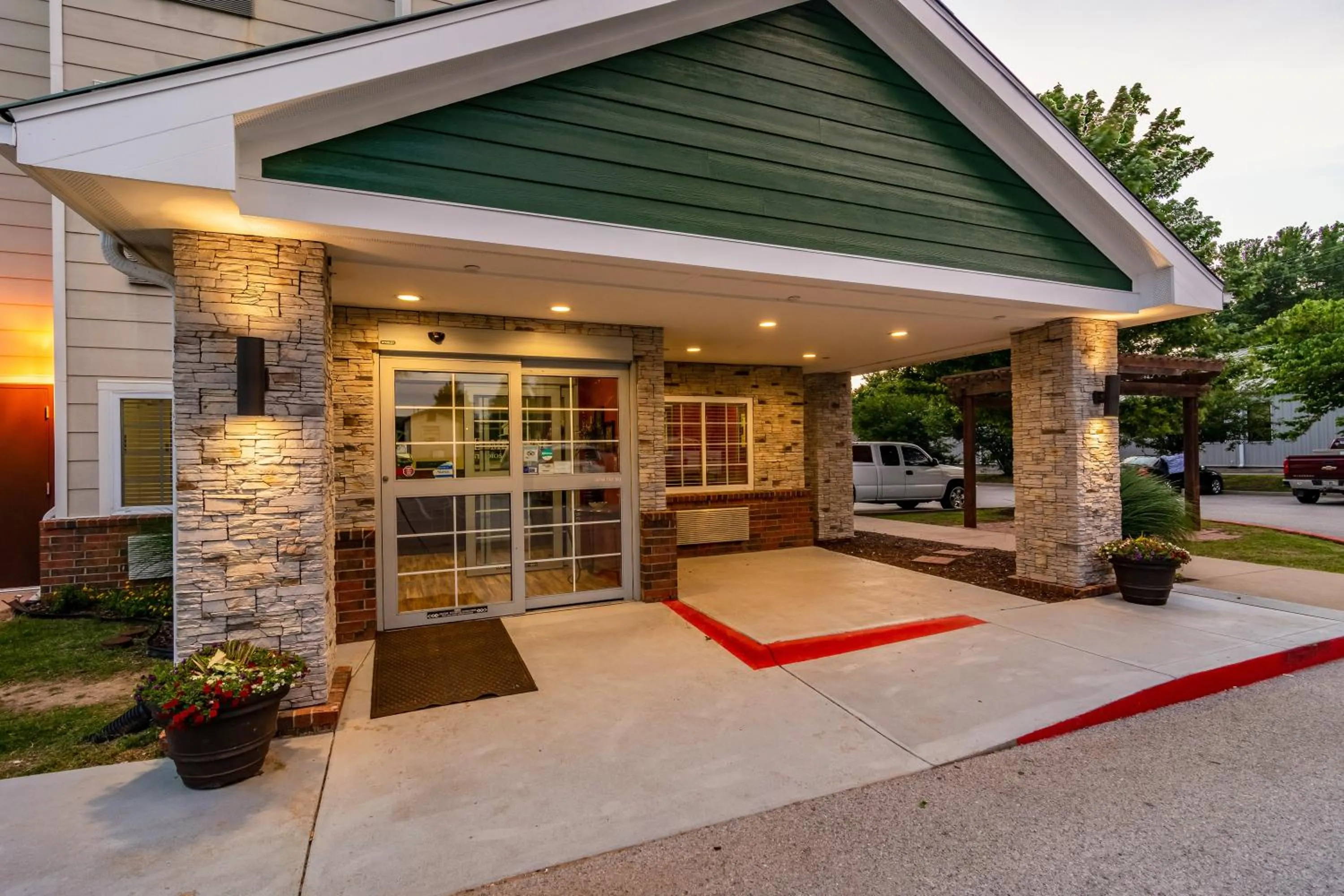 Property building in HomeTowne Studios & Suites by Red Roof Bentonville