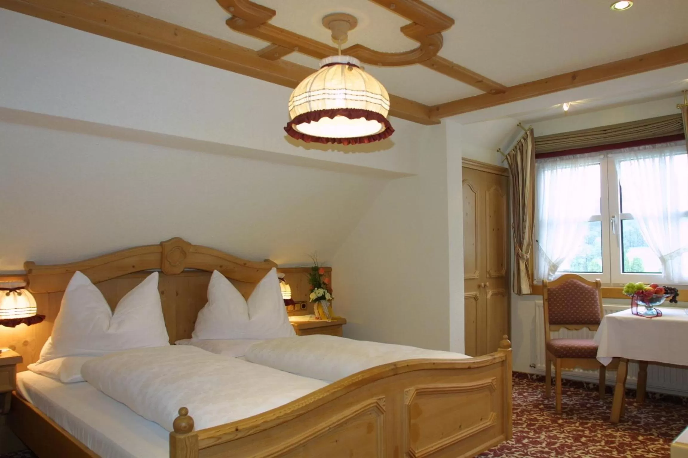 Bed in Hotel Neuwirt