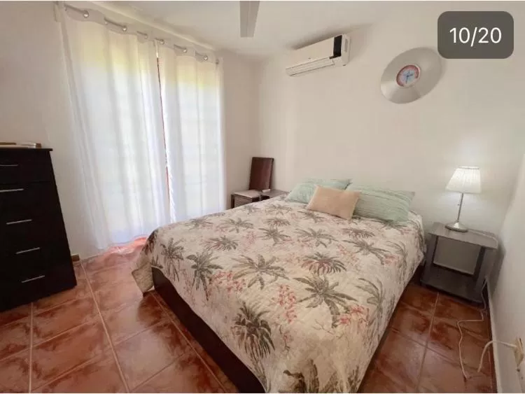 Bed in Los Corales Luxury Villas Beach Club and Spa