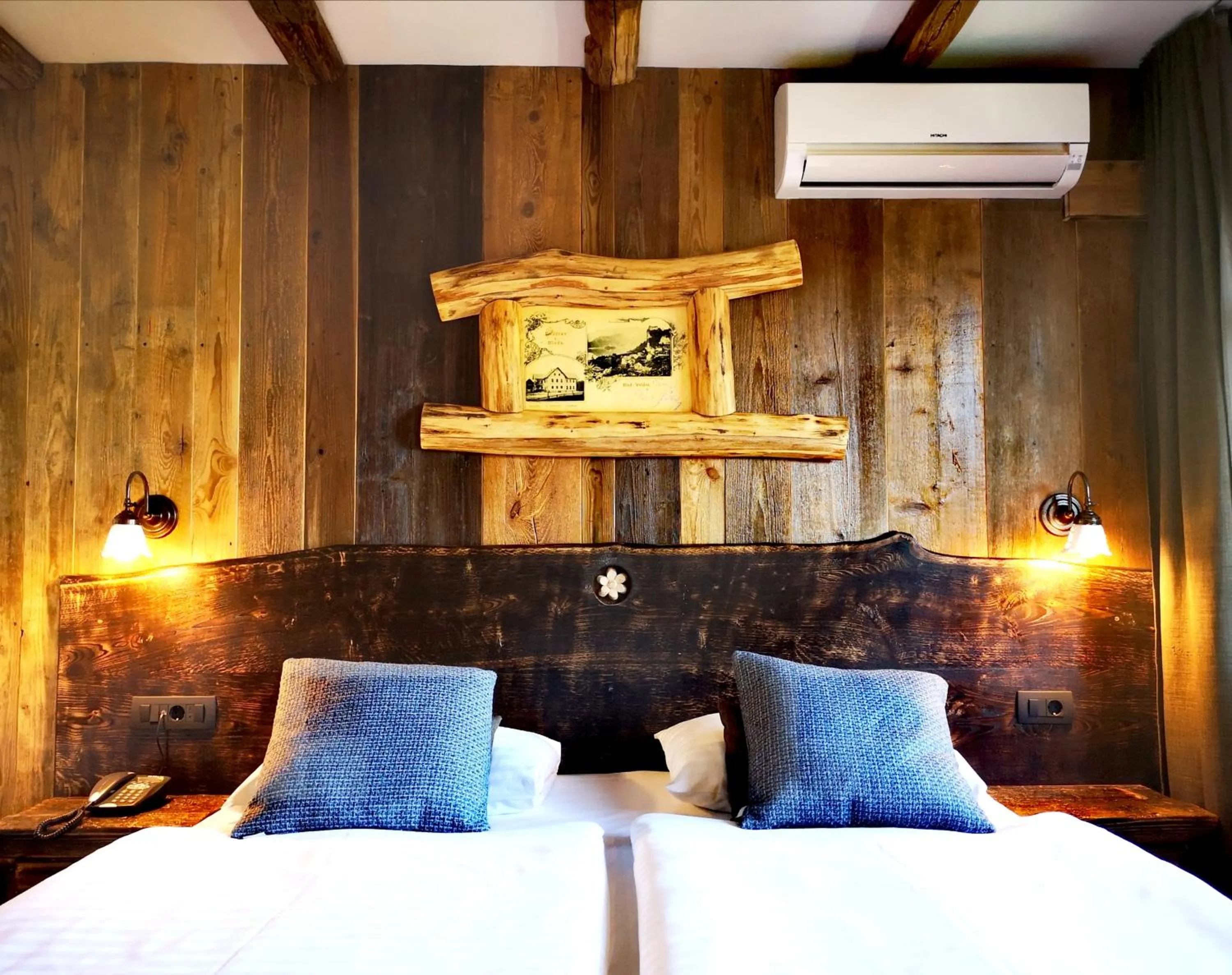 Bed in Ribno Alpine Hotel