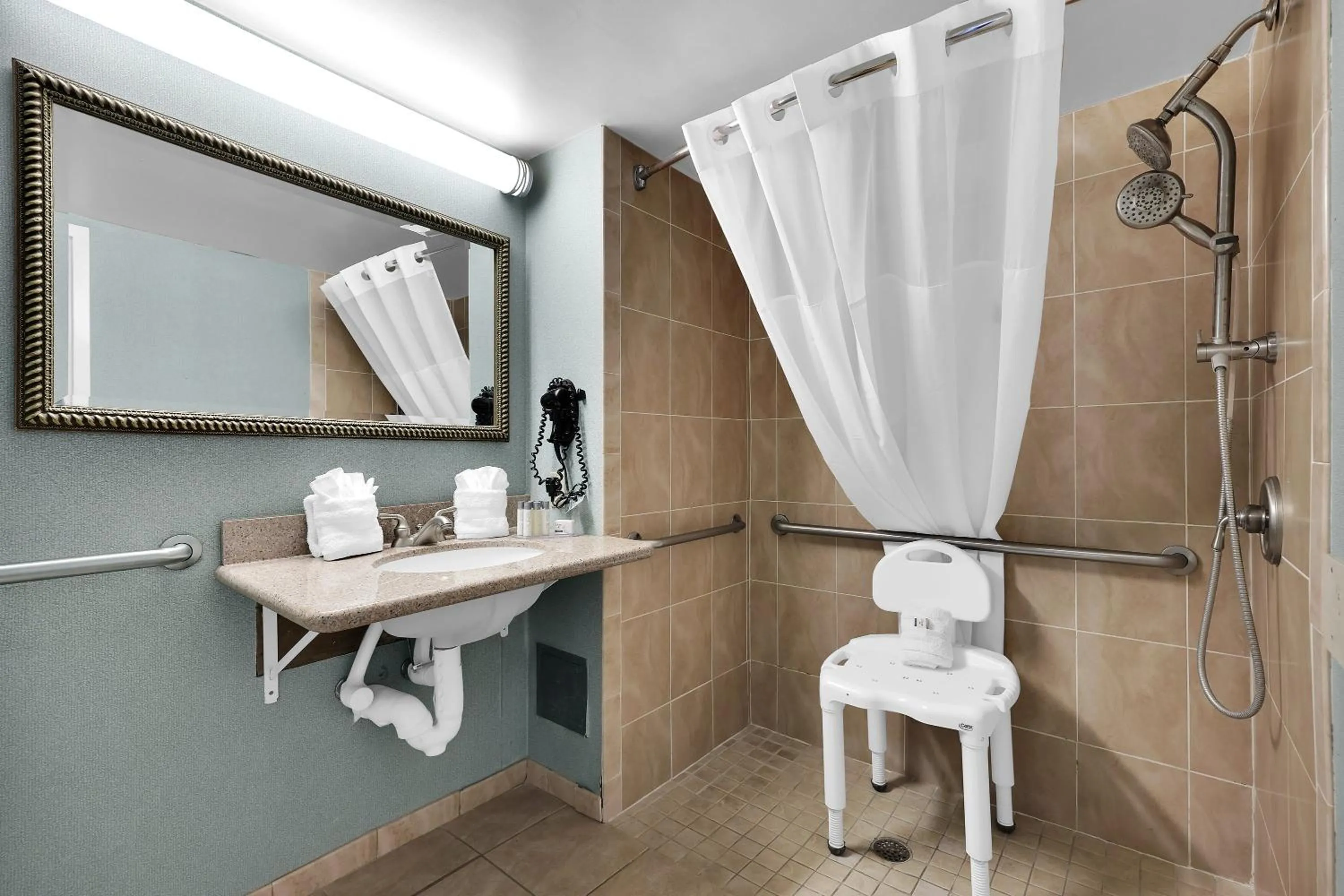 Shower in Ramada by Wyndham Jacksonville I-95 by Butler Blvd