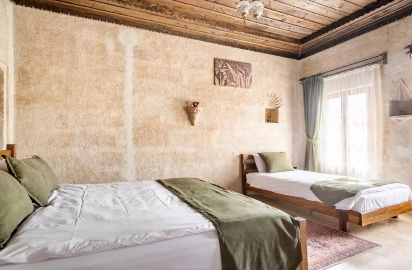 Bed in Uzay Cave Suite Hotel