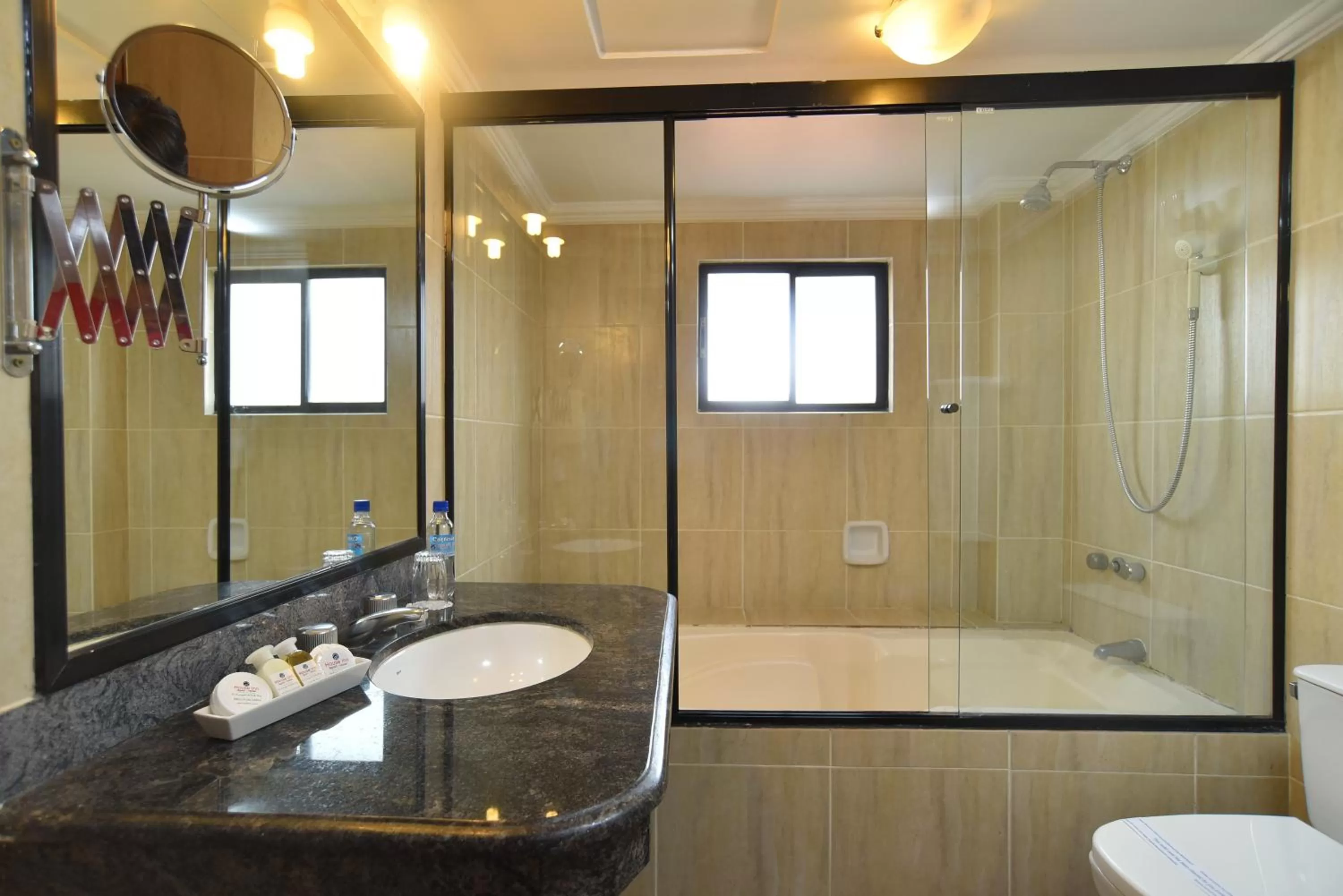 Bathroom in House Inn Apart Hotel