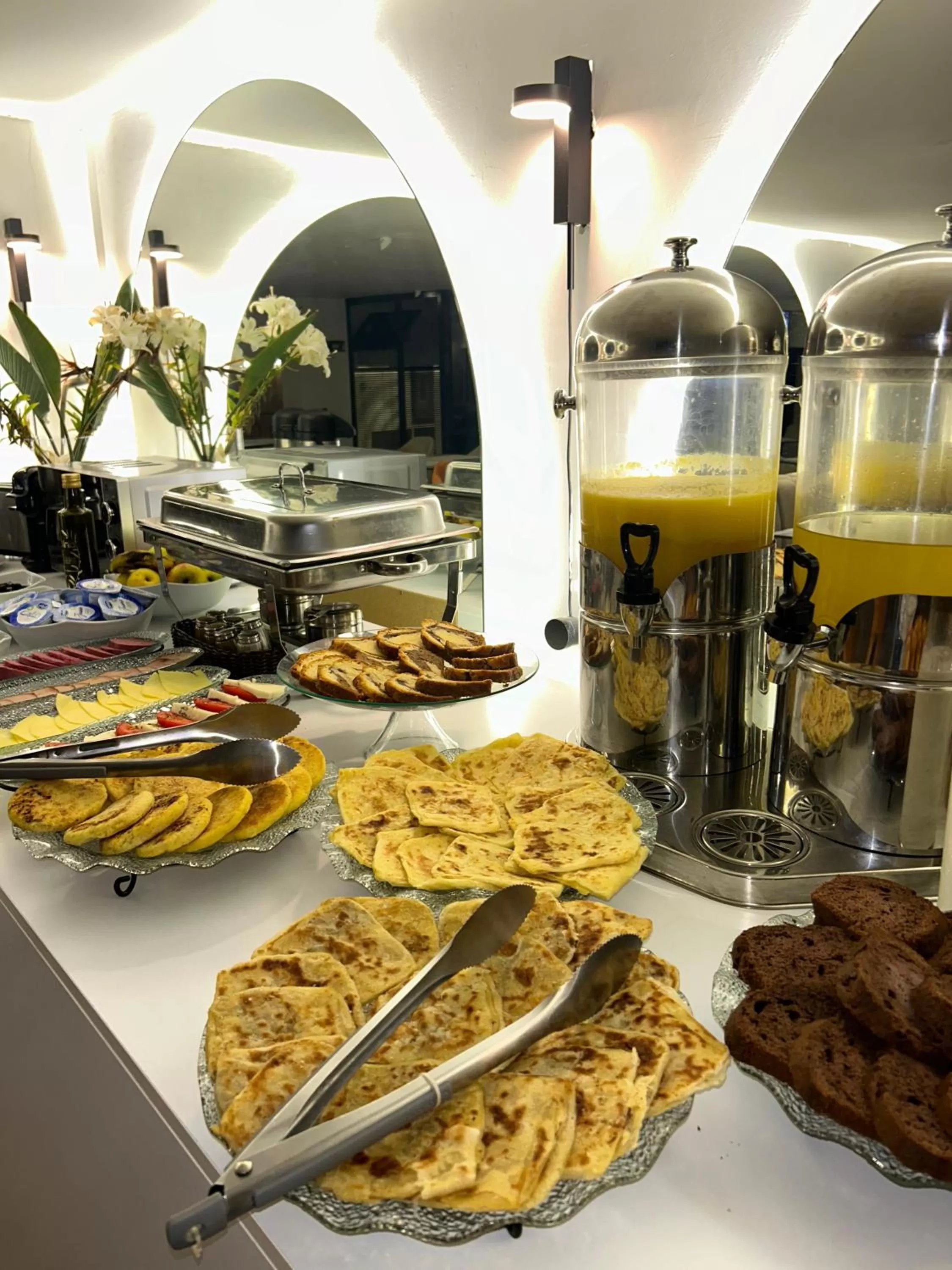 Buffet breakfast in Le M Hôtel