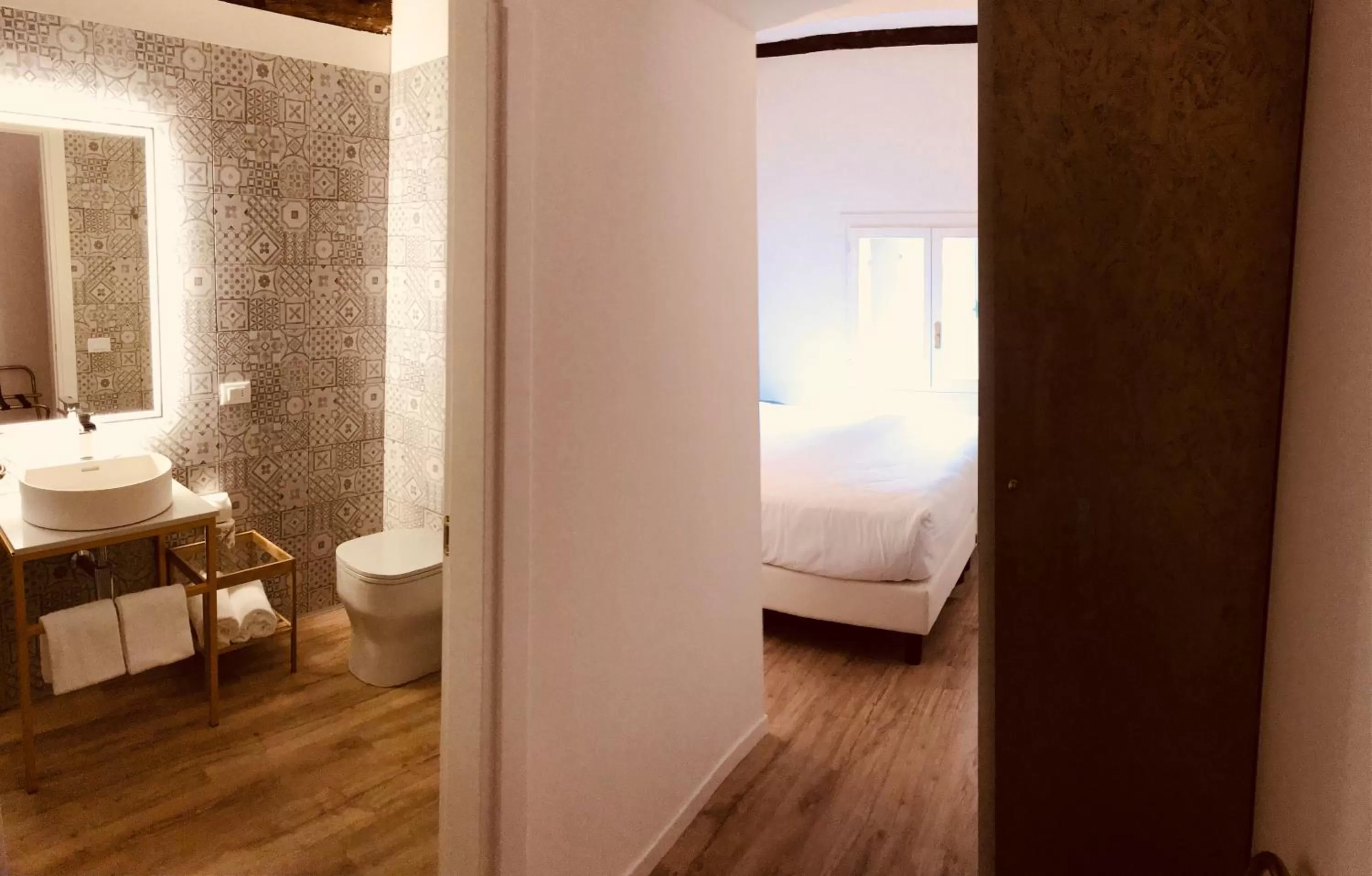 Bed in Palazzo Otello 1847 Wellness & Spa