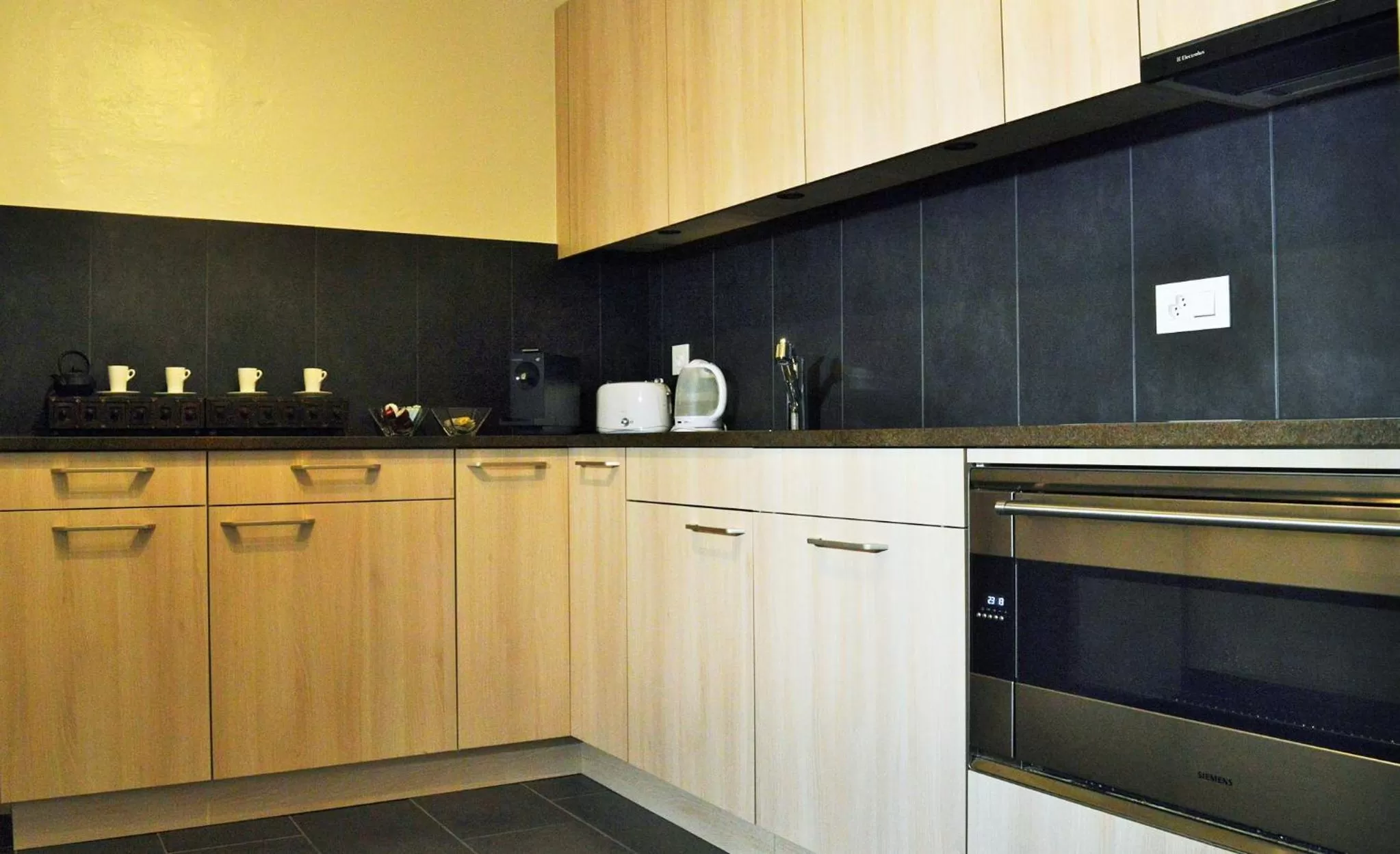 Kitchen or kitchenette in B&B Louis-Favre 21