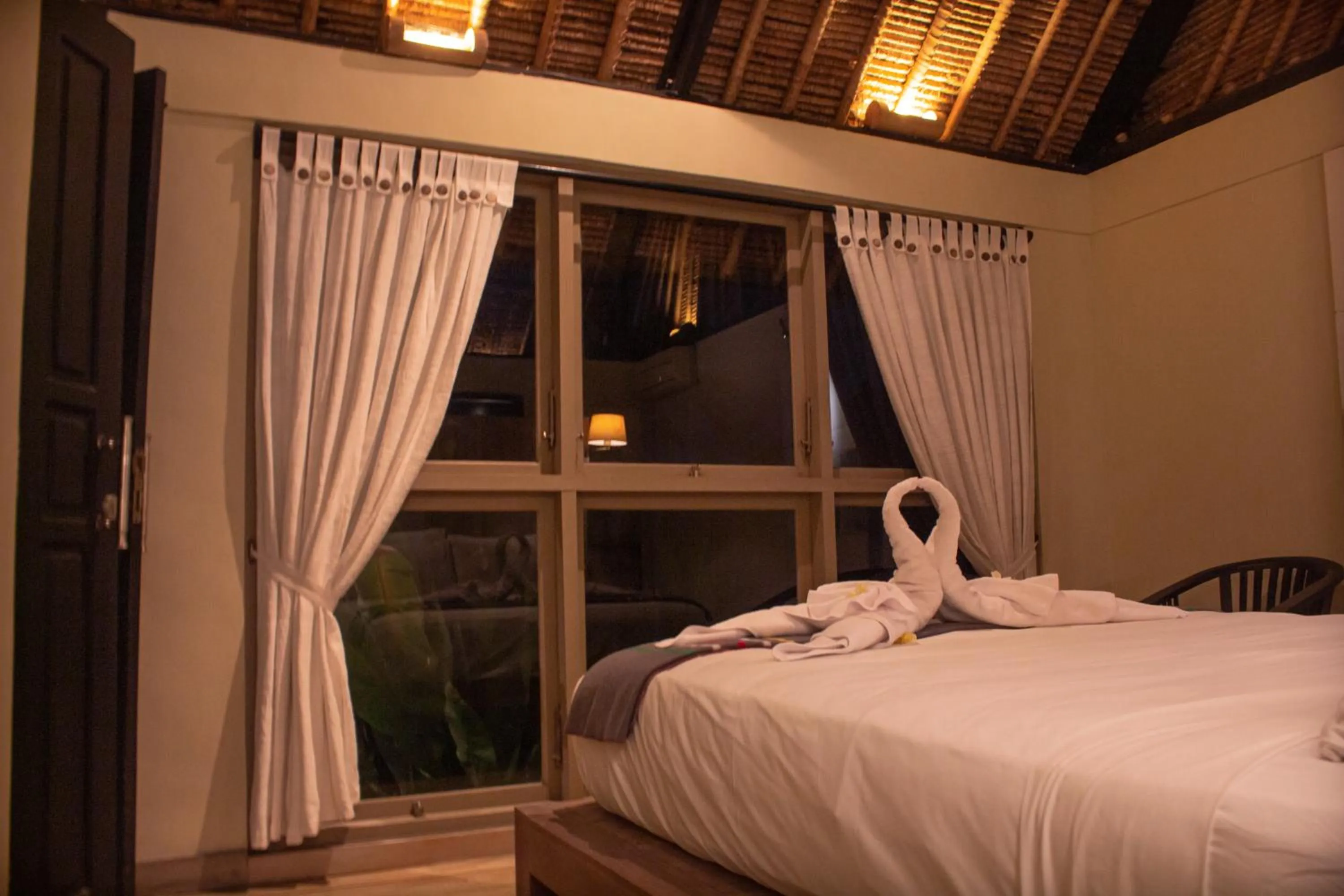 Bed in Villa Puri Darma Agung