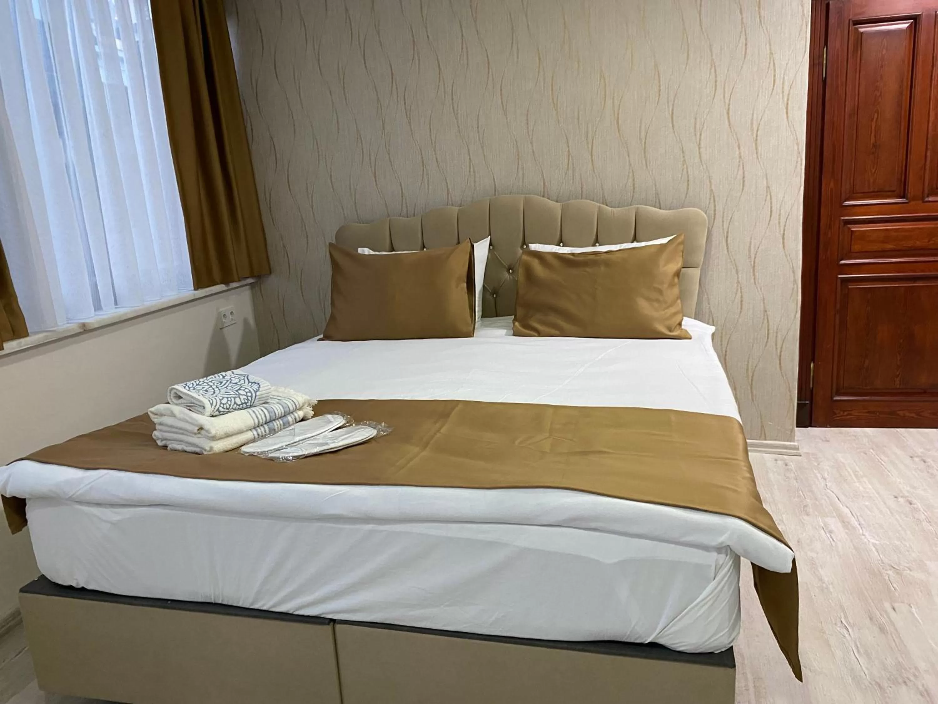 Bed in Atam Suites