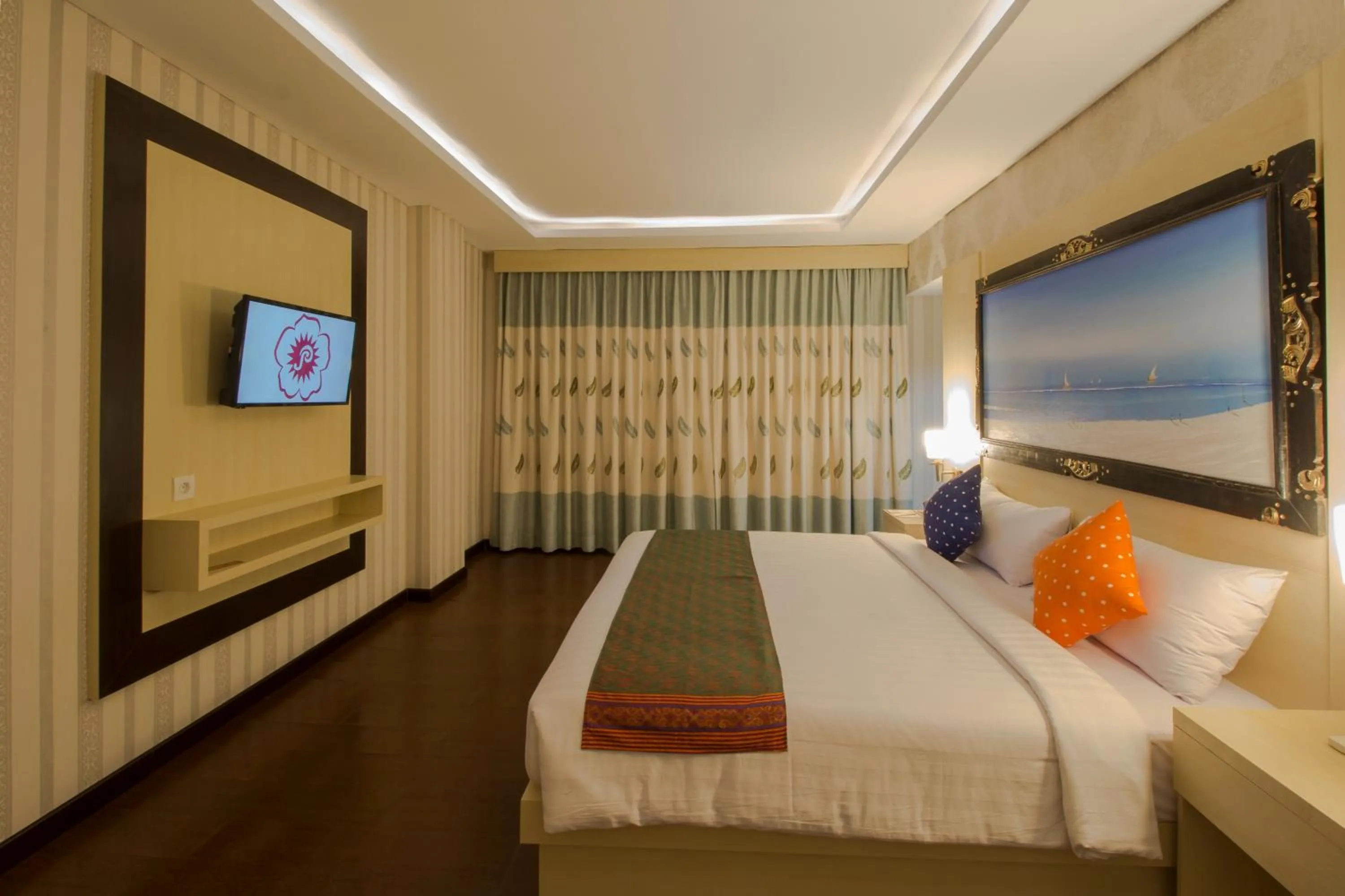 Photo of the whole room, Bed in Grand Puri Saron Hotel Yogyakarta