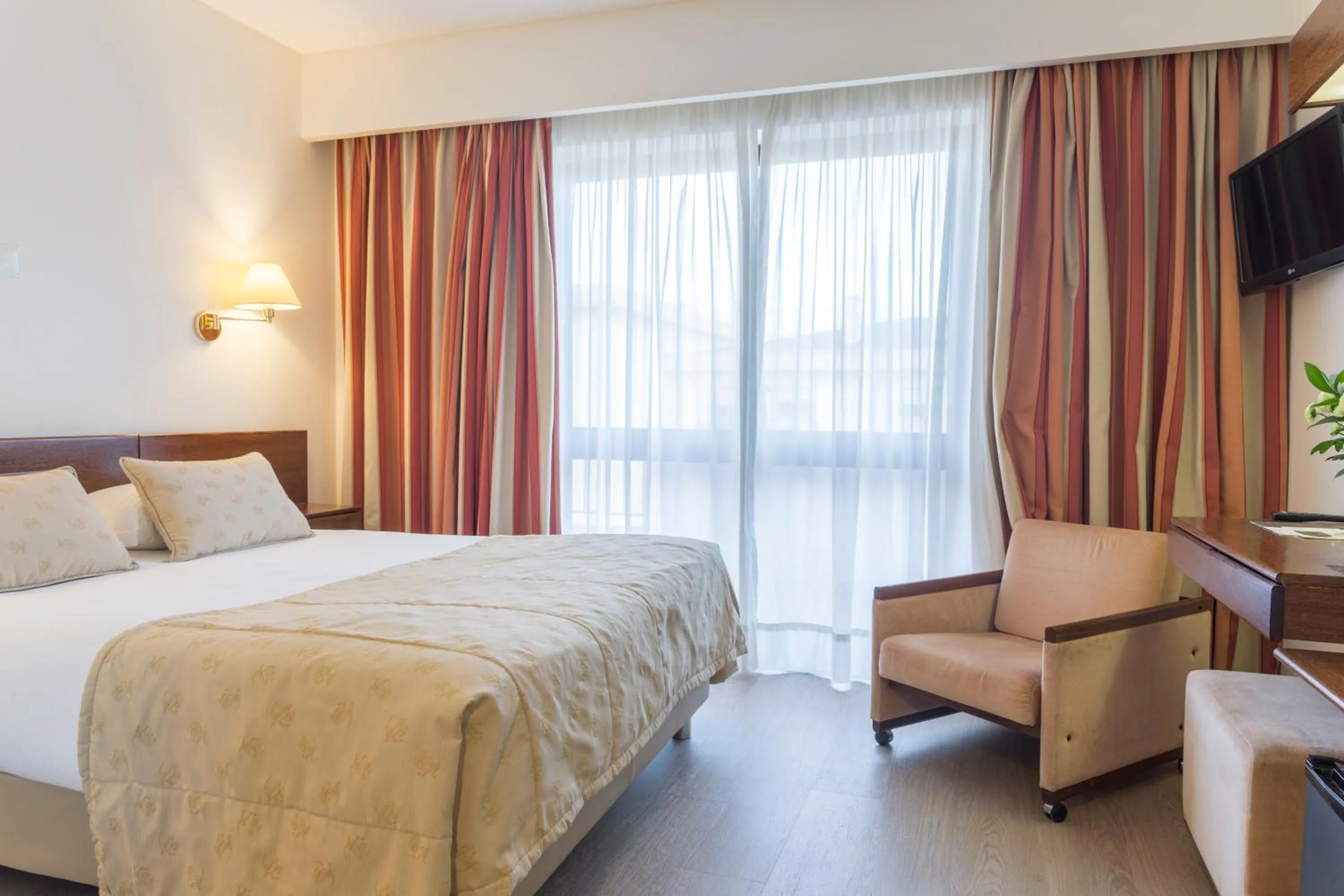 Bed in Hotel Cinquentenario & Conference Center