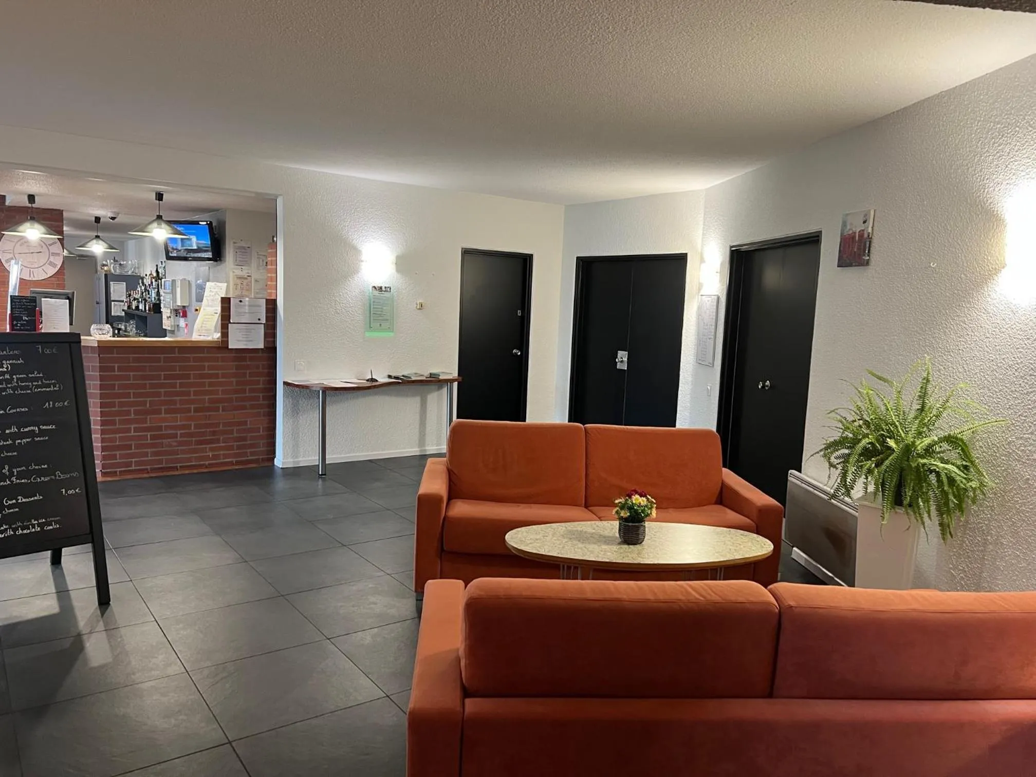 Living room in Logis Cottage Hôtel