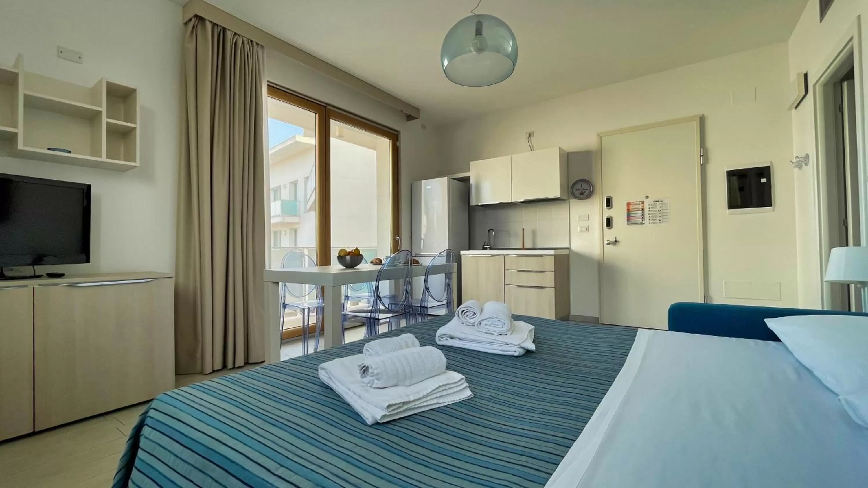 Seating area, Bed in La Corte di Leuca Residence