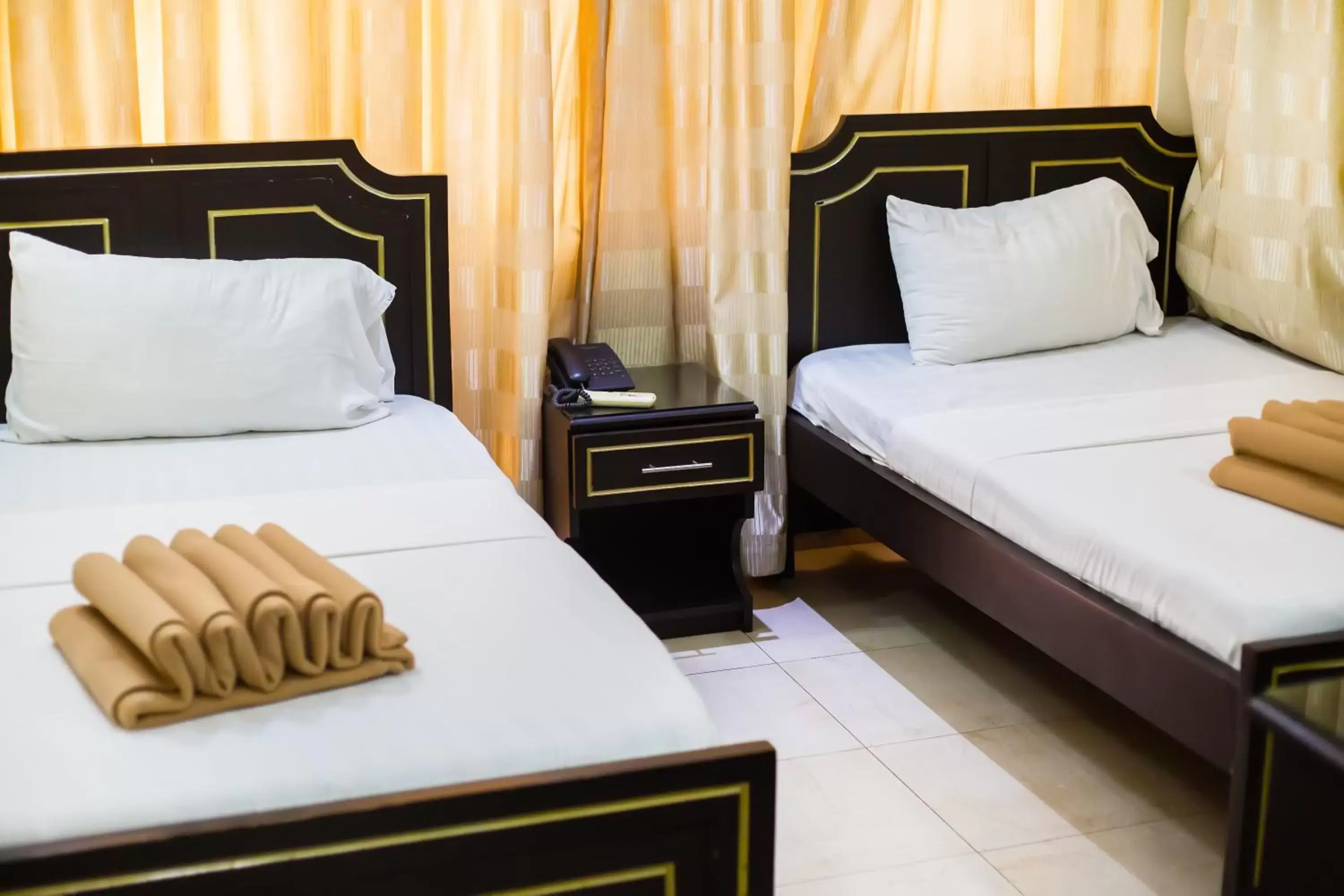 Twin Room with City View in Sleep Inn Hotel - Kariakoo Twin Room with City View in Sleep Inn Hotel - Kariakoo