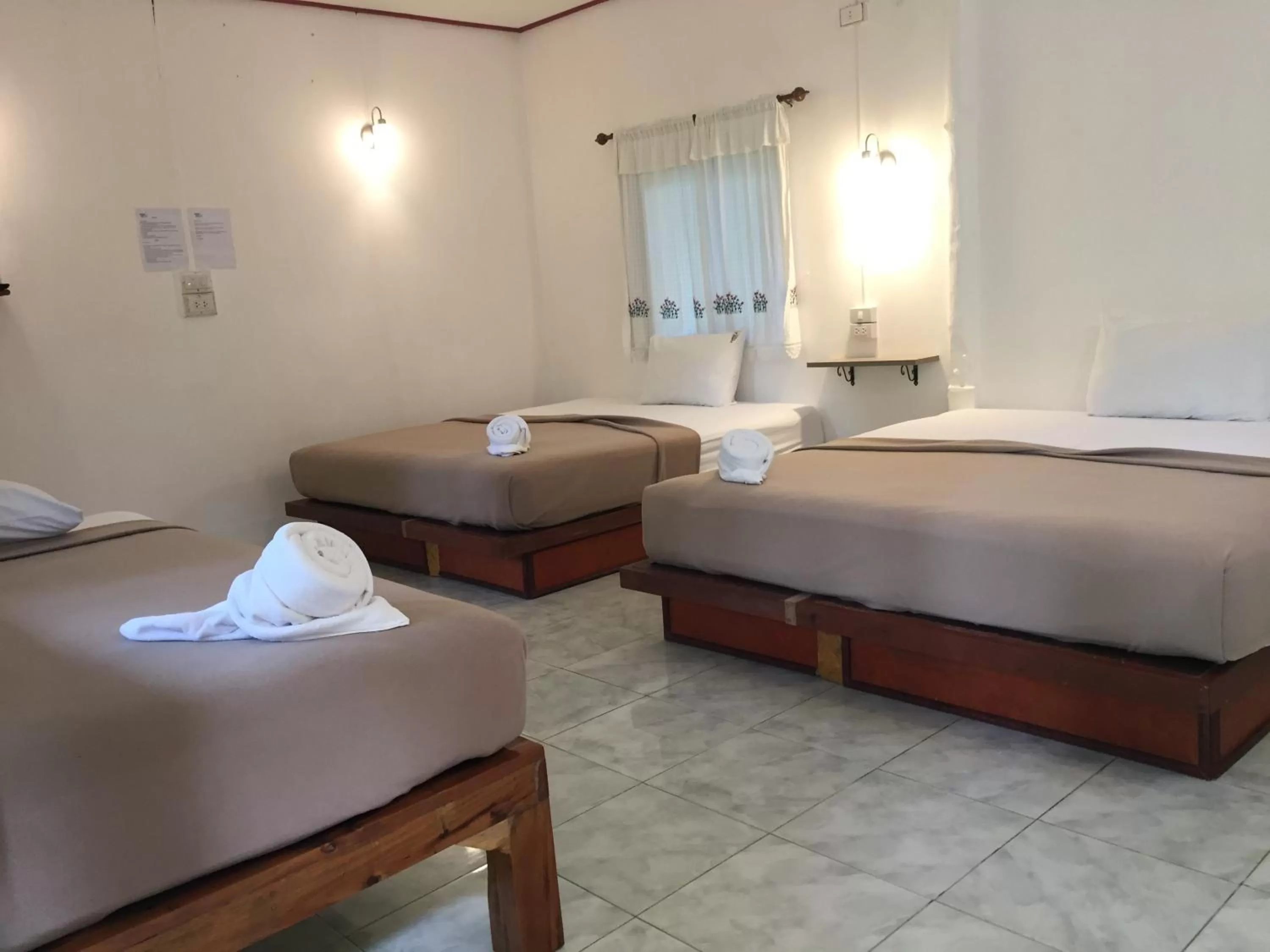 Bed in Khao Sok Jungle Huts Resort