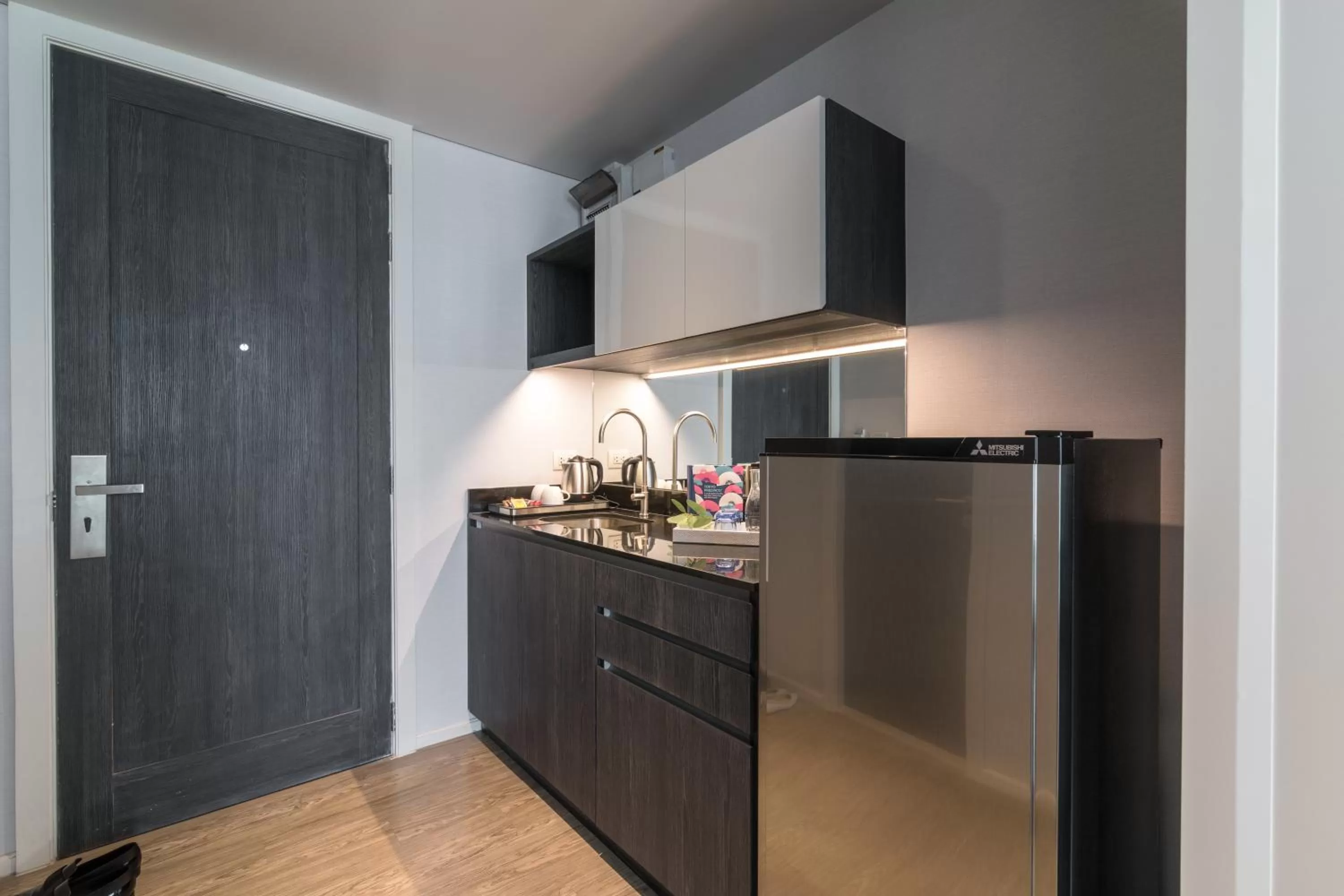 Kitchen or kitchenette in Apartelle Jatujak Hotel