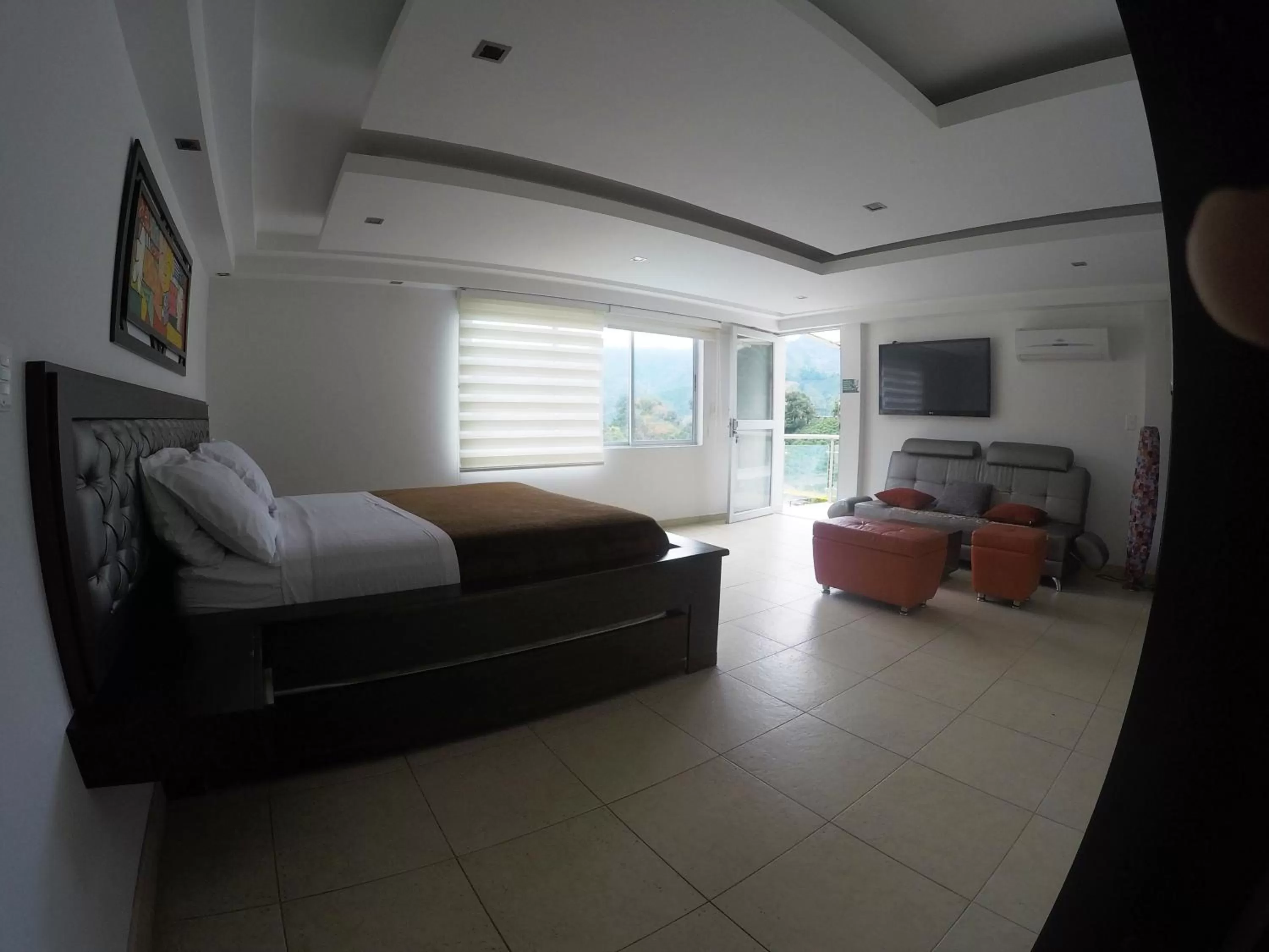 Bed, Seating Area in Sky Club Eco Hotel