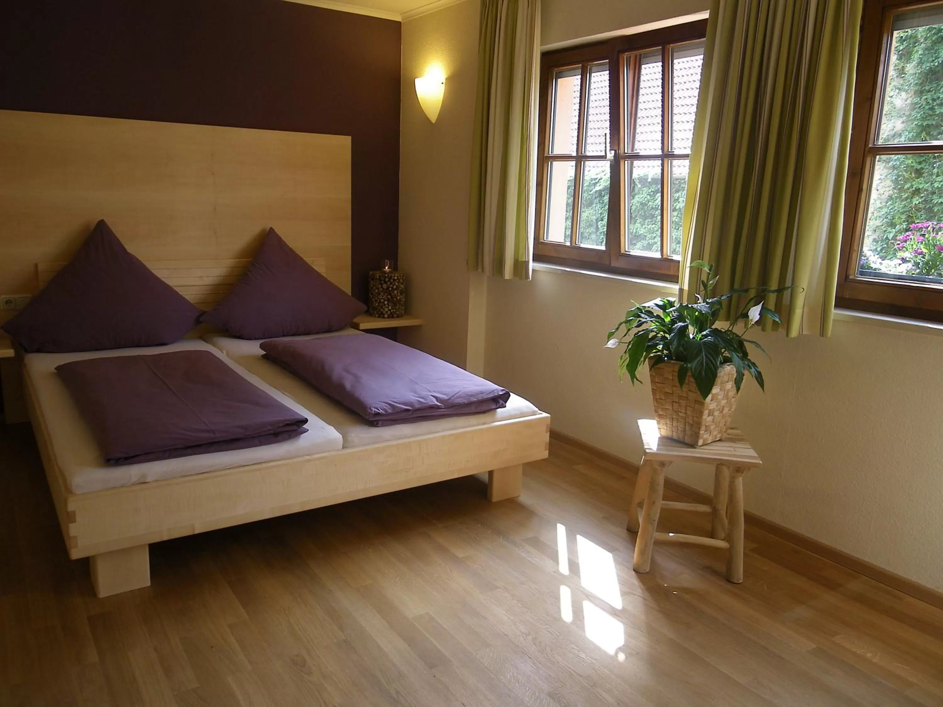 Photo of the whole room, Bed in BIO Hotel Bayerischer Wirt Augsburg