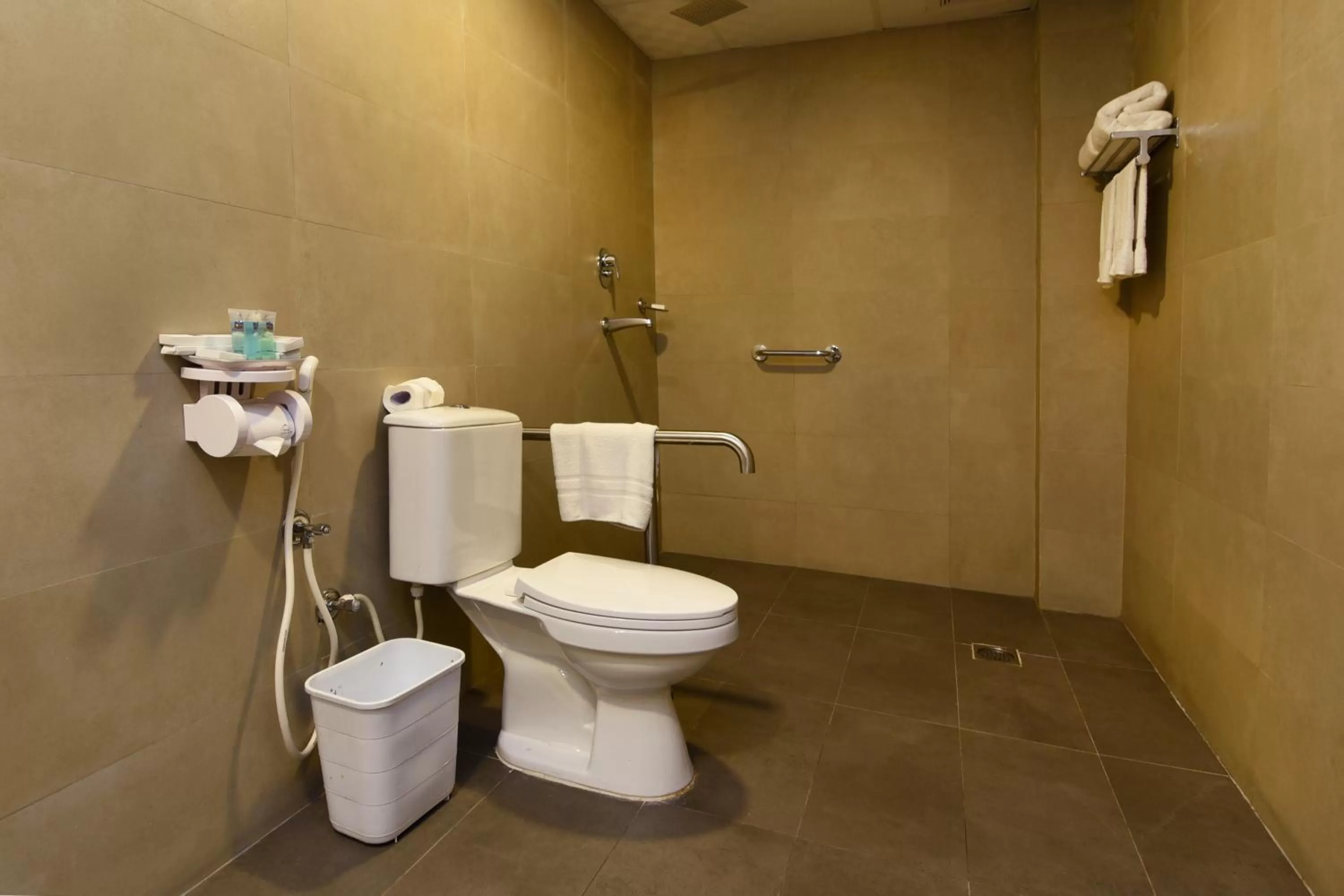 Toilet in Park Village Resort by KGH Group