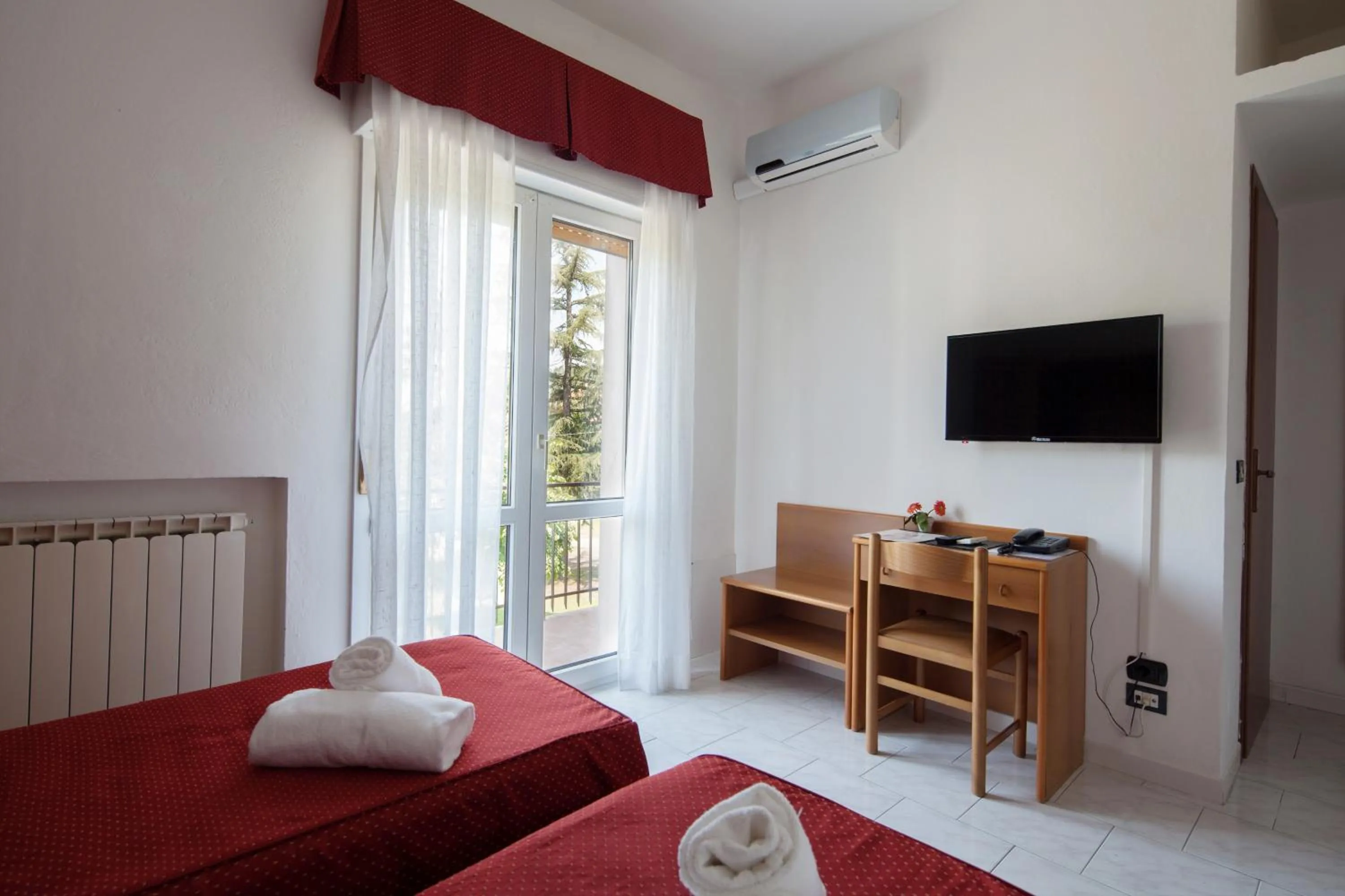 Photo of the whole room, Bed in Hotel Nella