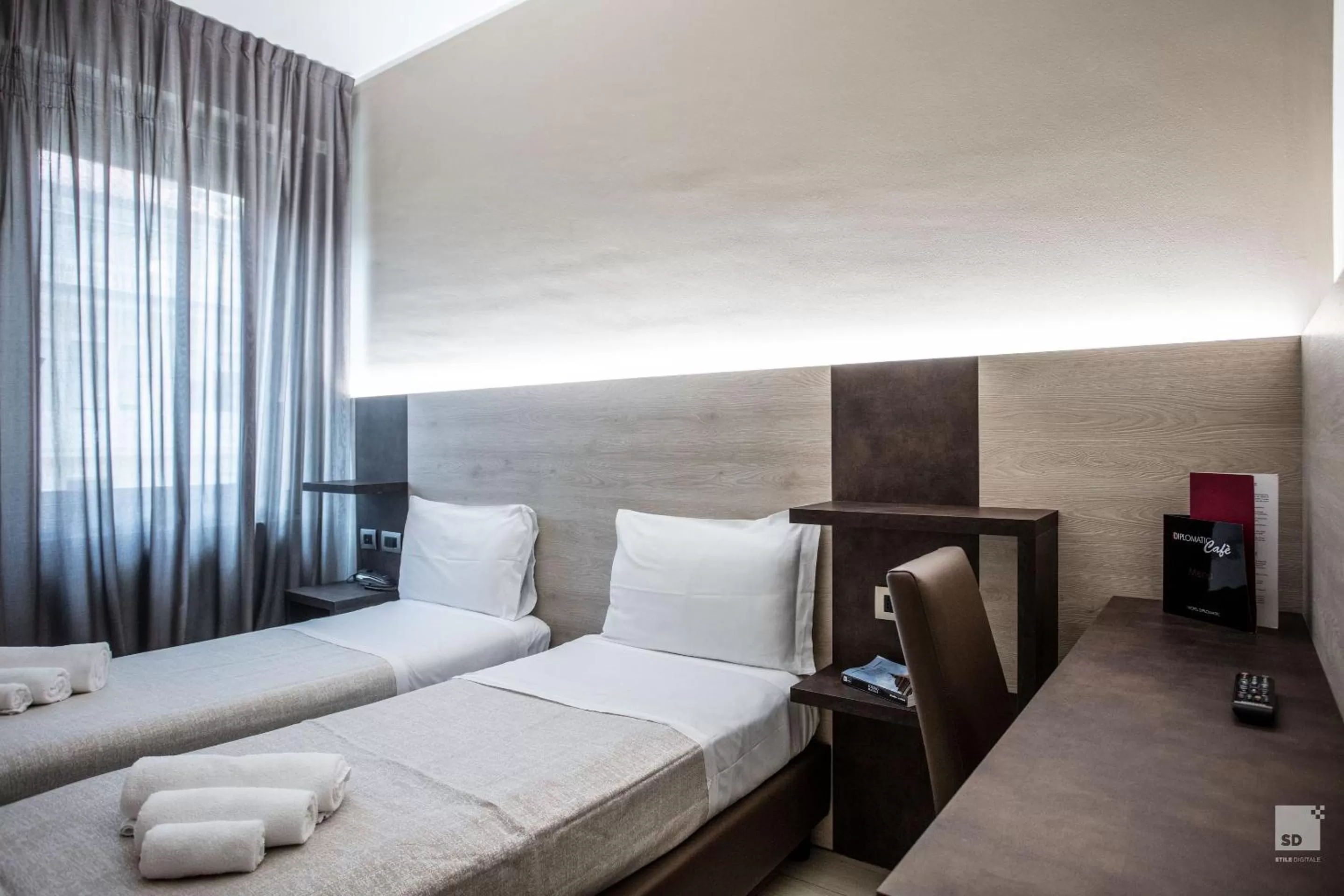 Bed in Hotel Diplomatic