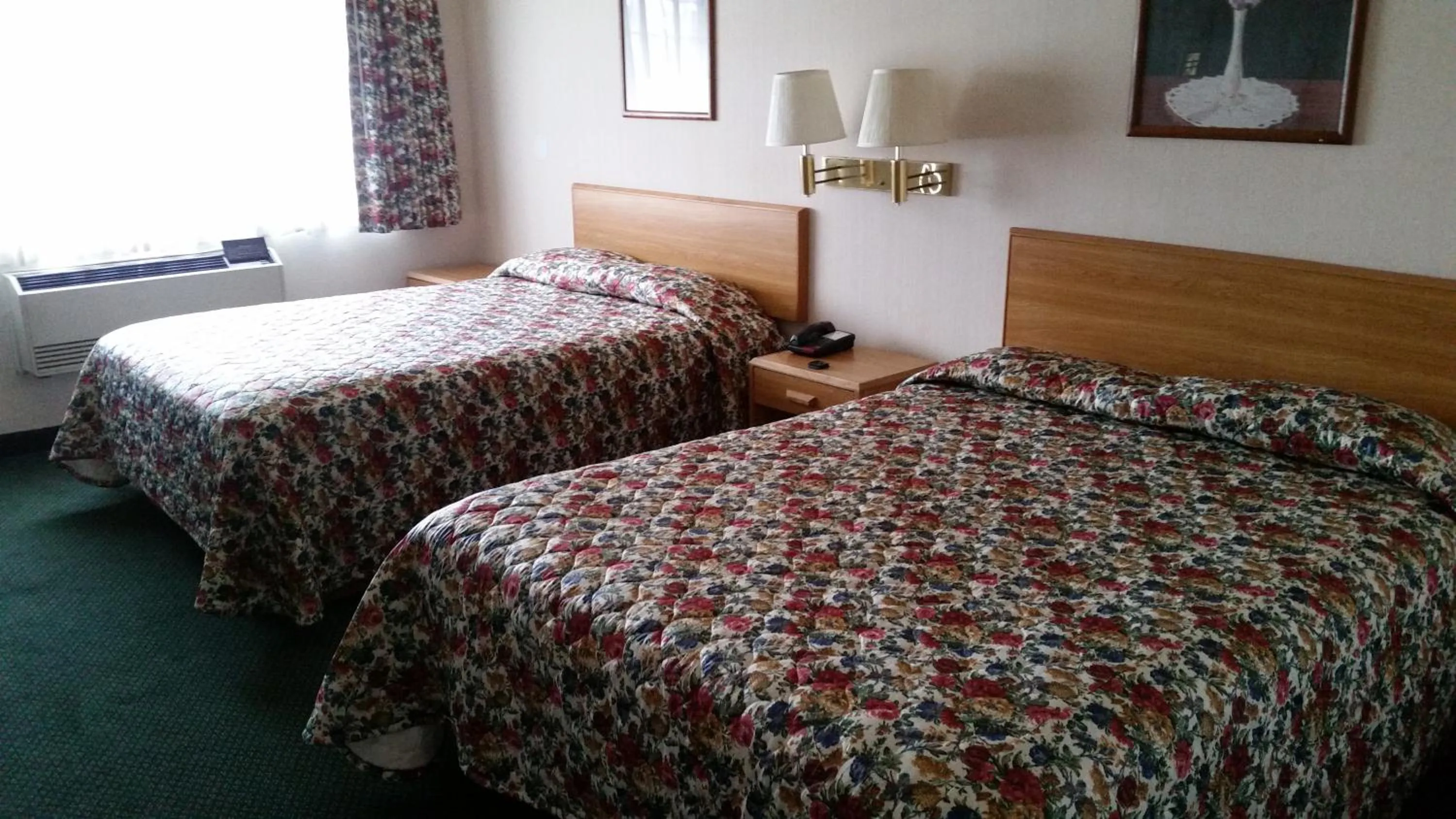 Bed in Economy Inn Motel