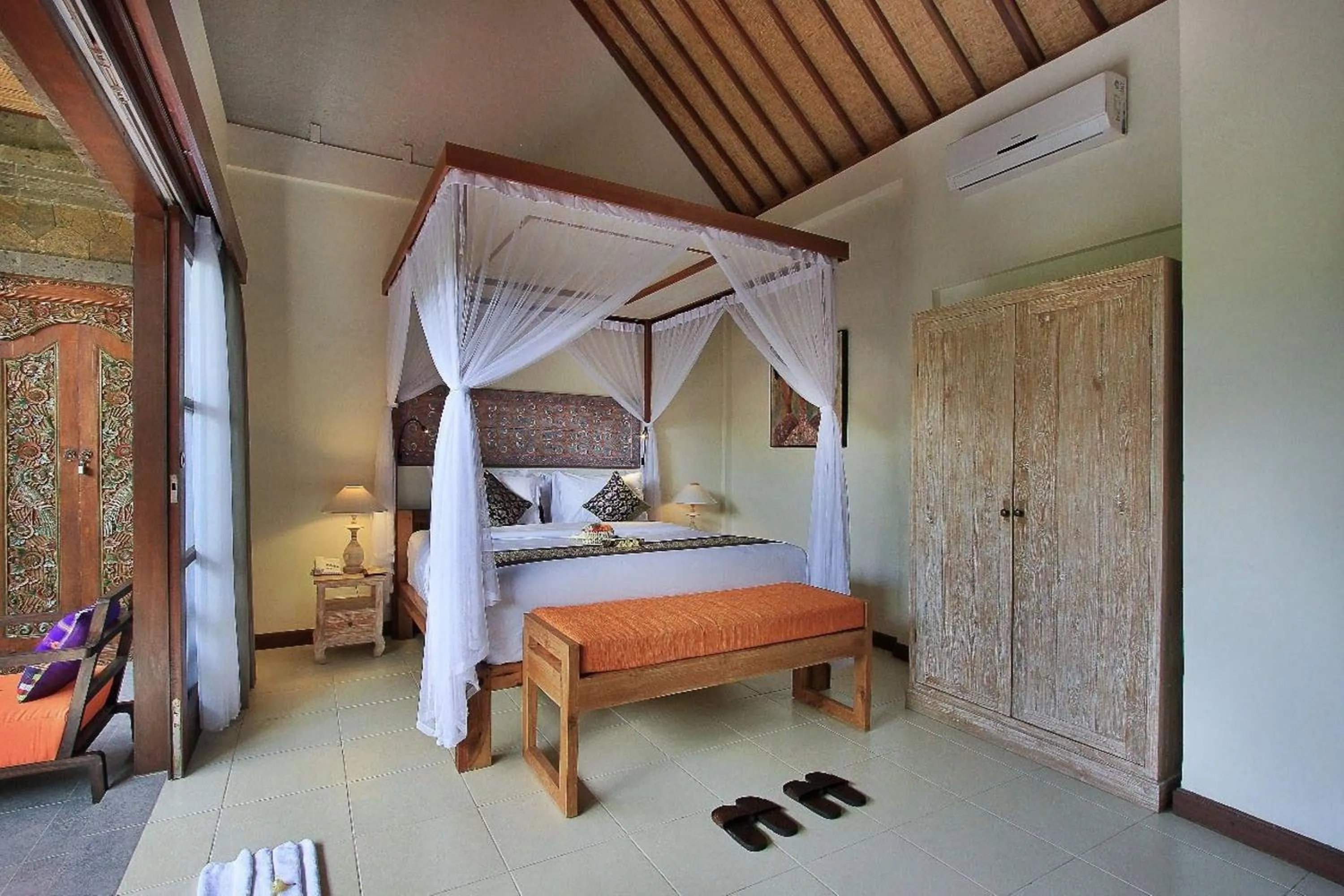 Bed in D'Legon Villas