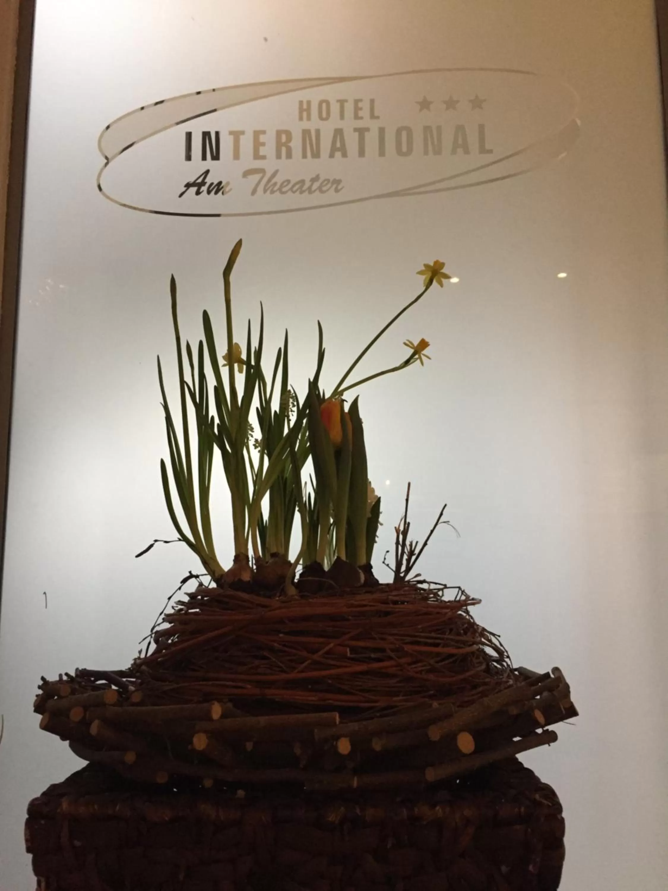 Property logo or sign in Hotel International am Theater