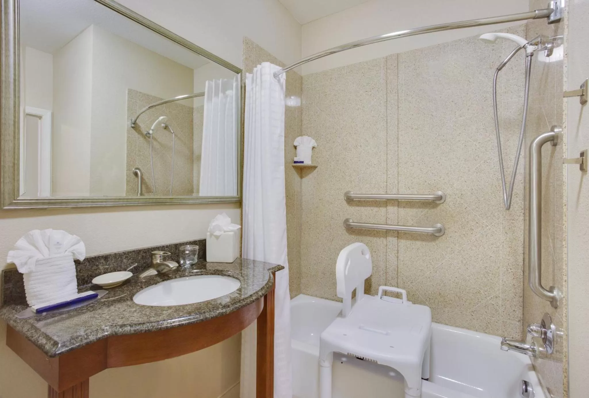 Bathroom in Candlewood Suites Virginia Beach Town Center by IHG