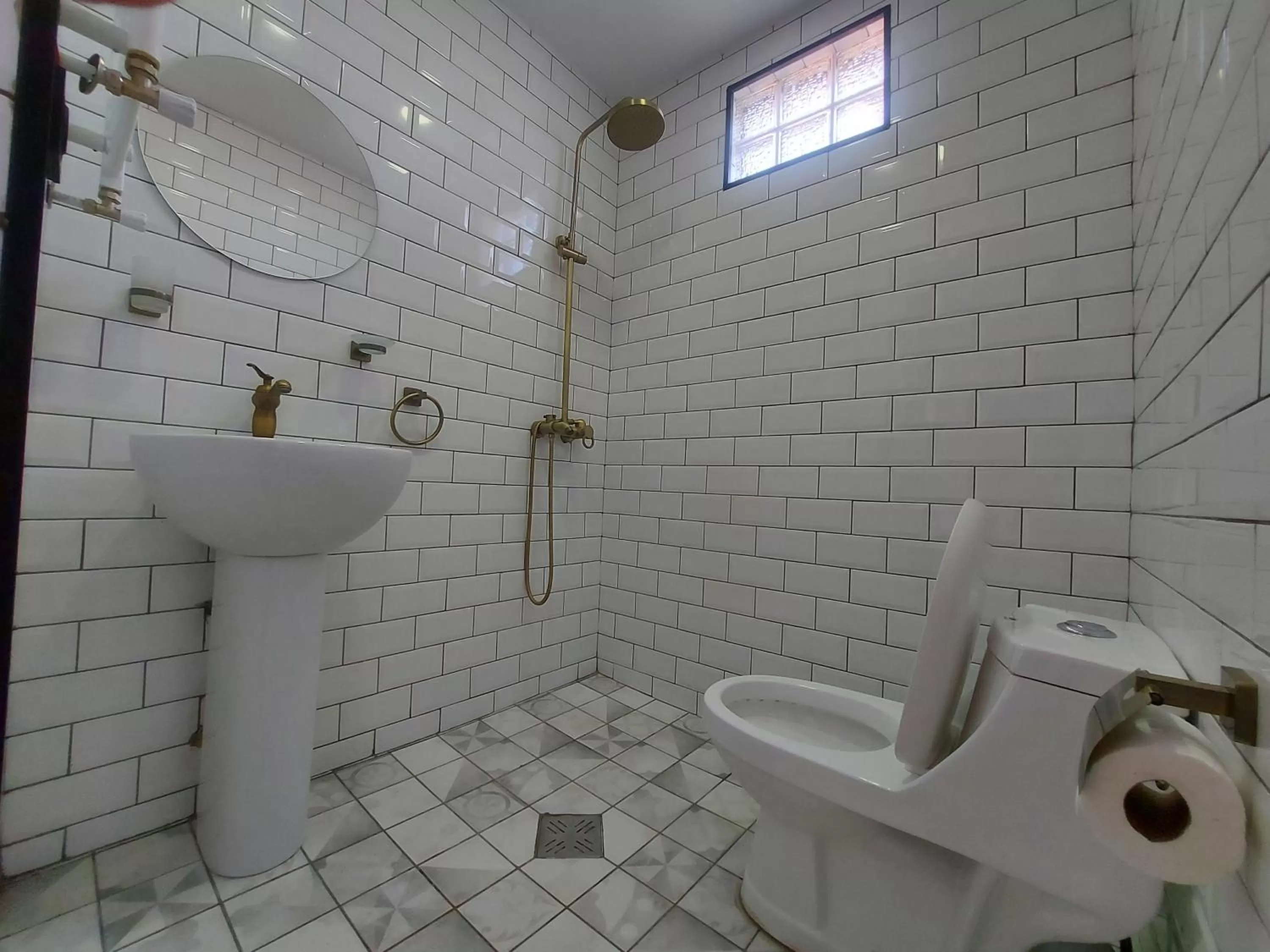 Bathroom in Level Up Hotel & Restaurant