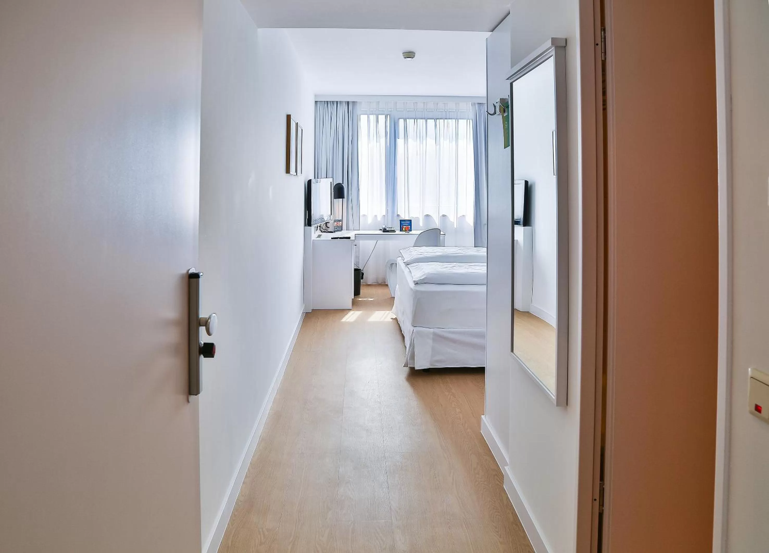 Photo of the whole room, Bed in Hotel Frankfurt Messe Affiliated by Meliá