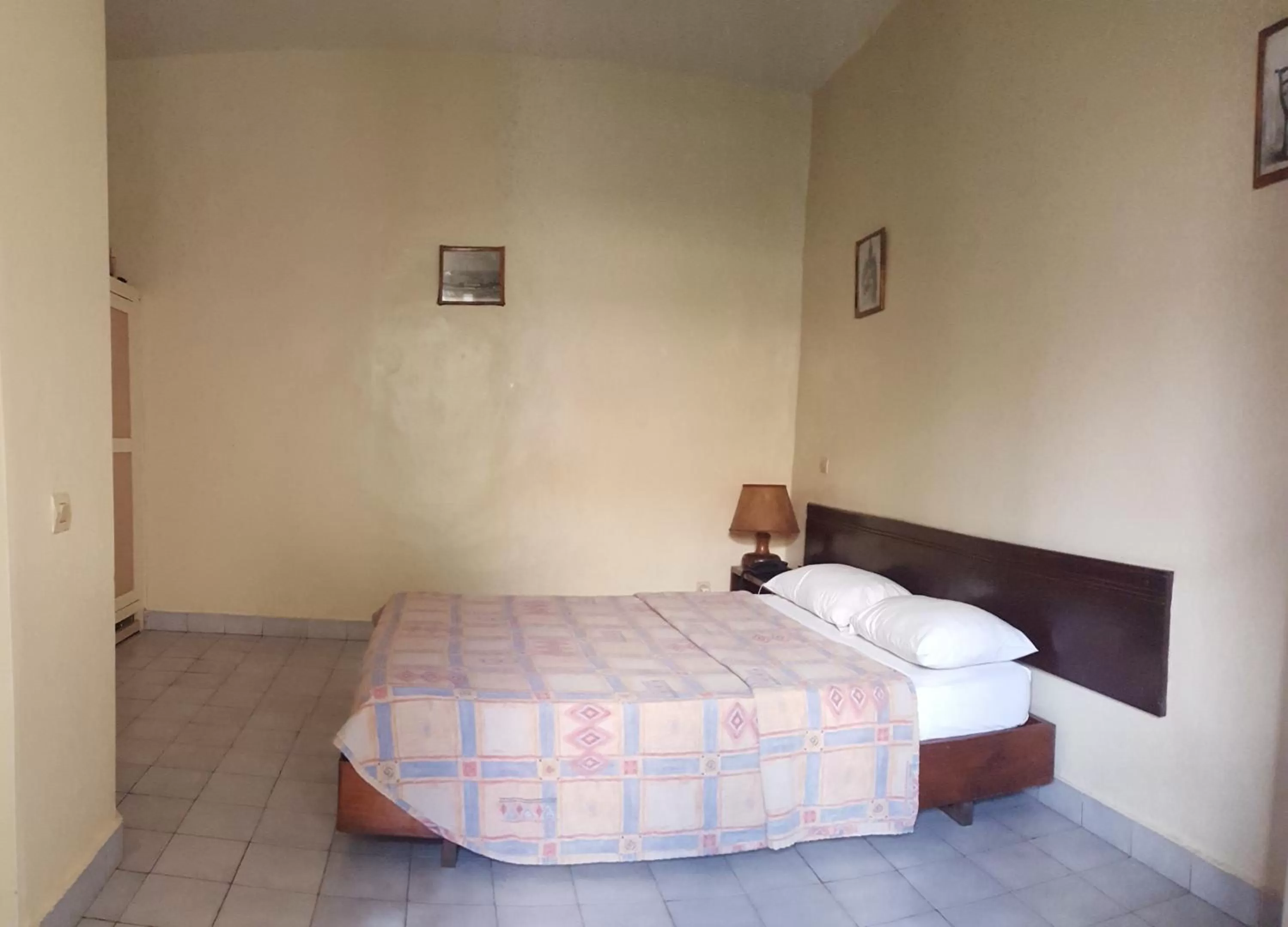 Bed in Hôtel Saint-Louis Sun Dakar