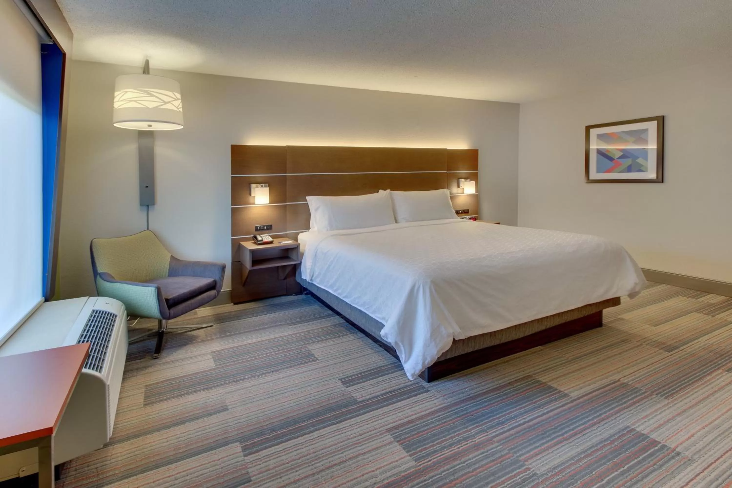 Photo of the whole room, Bed in Holiday Inn Express & Suites Atlanta Perimeter Mall Hotel by IHG