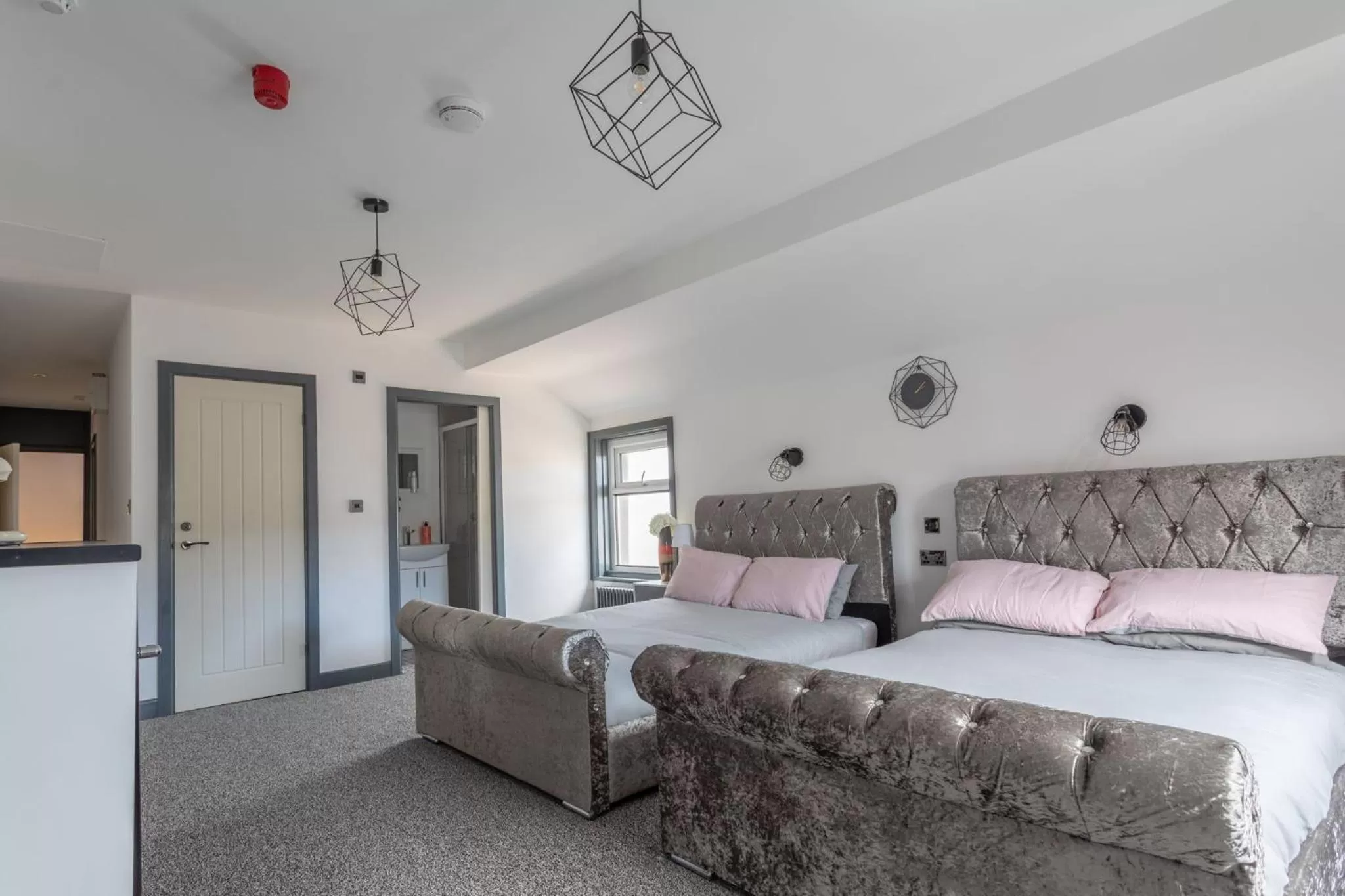 Bed in RESIDENCY LUXURY SEAFRONT HOTEL