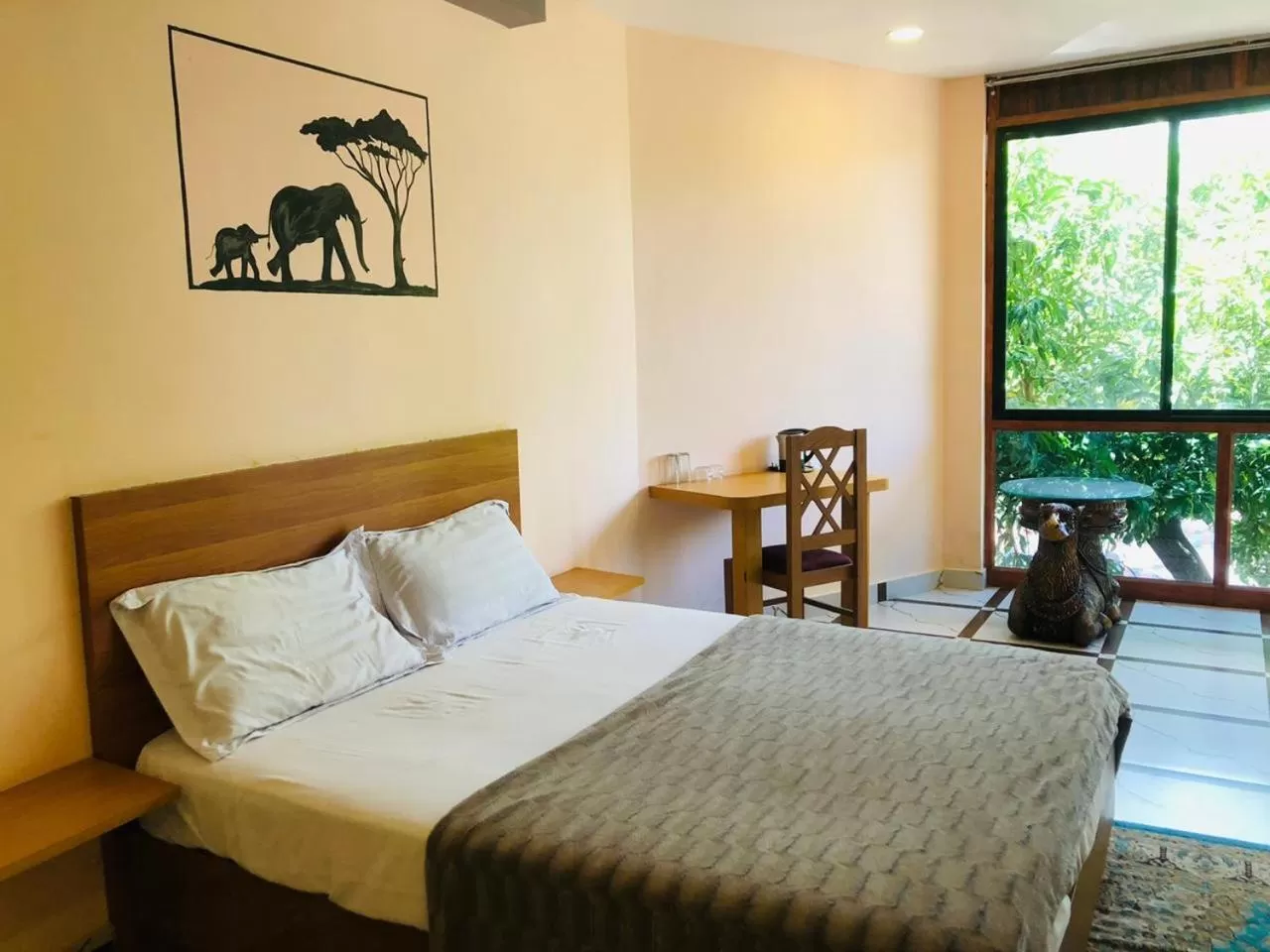 Bed, Room Photo in Udaya Resort