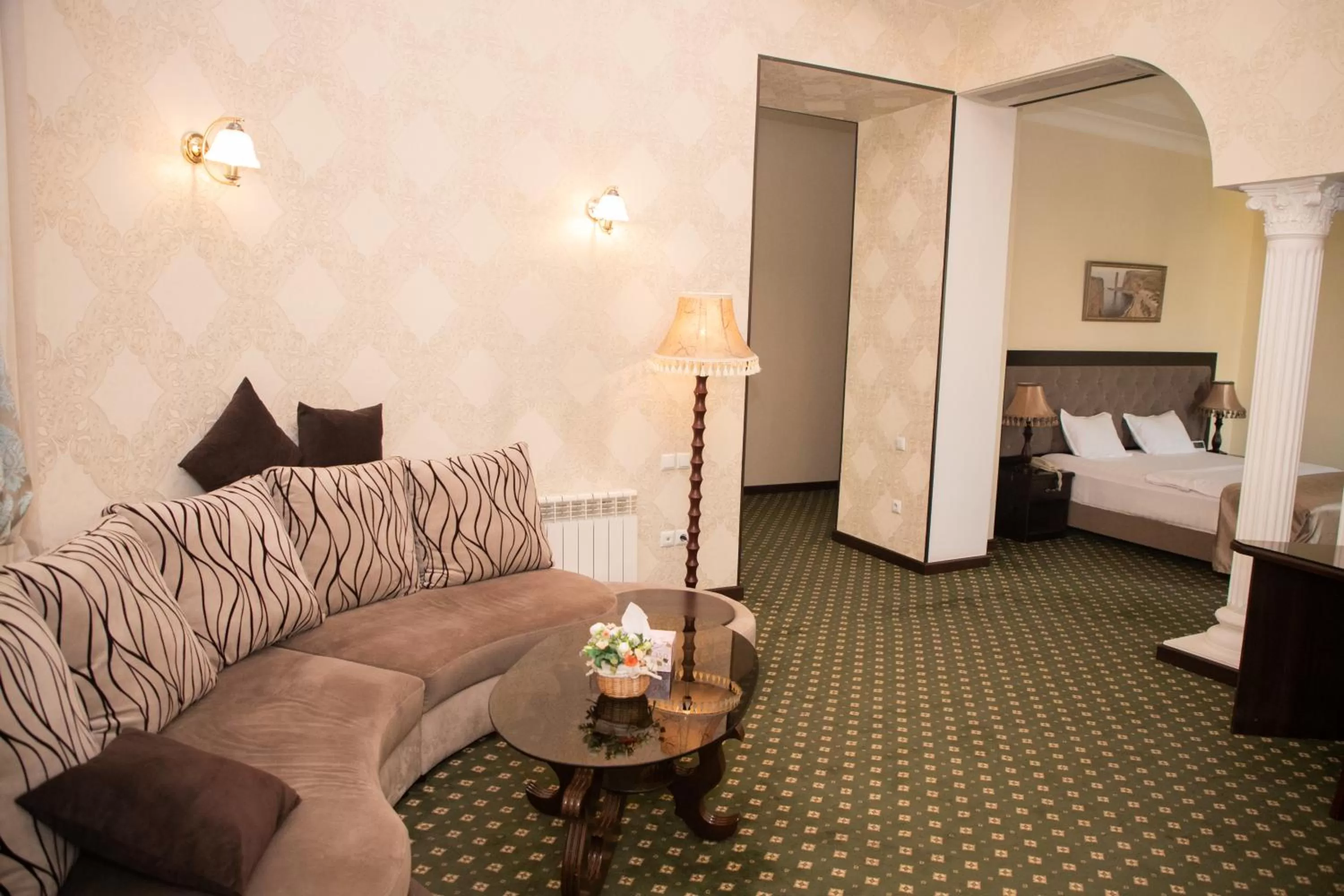 Living room, Bed in Gloria Hotel