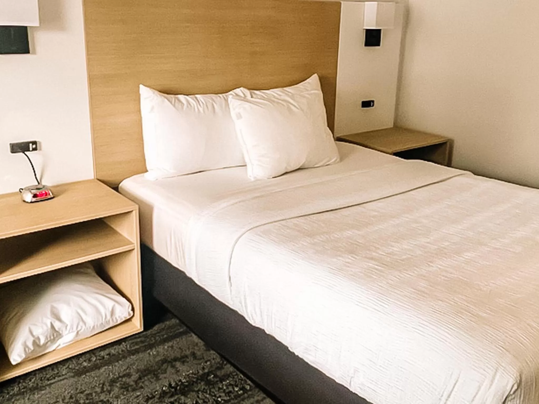 Bed in La Place Rendez-Vous Hotel