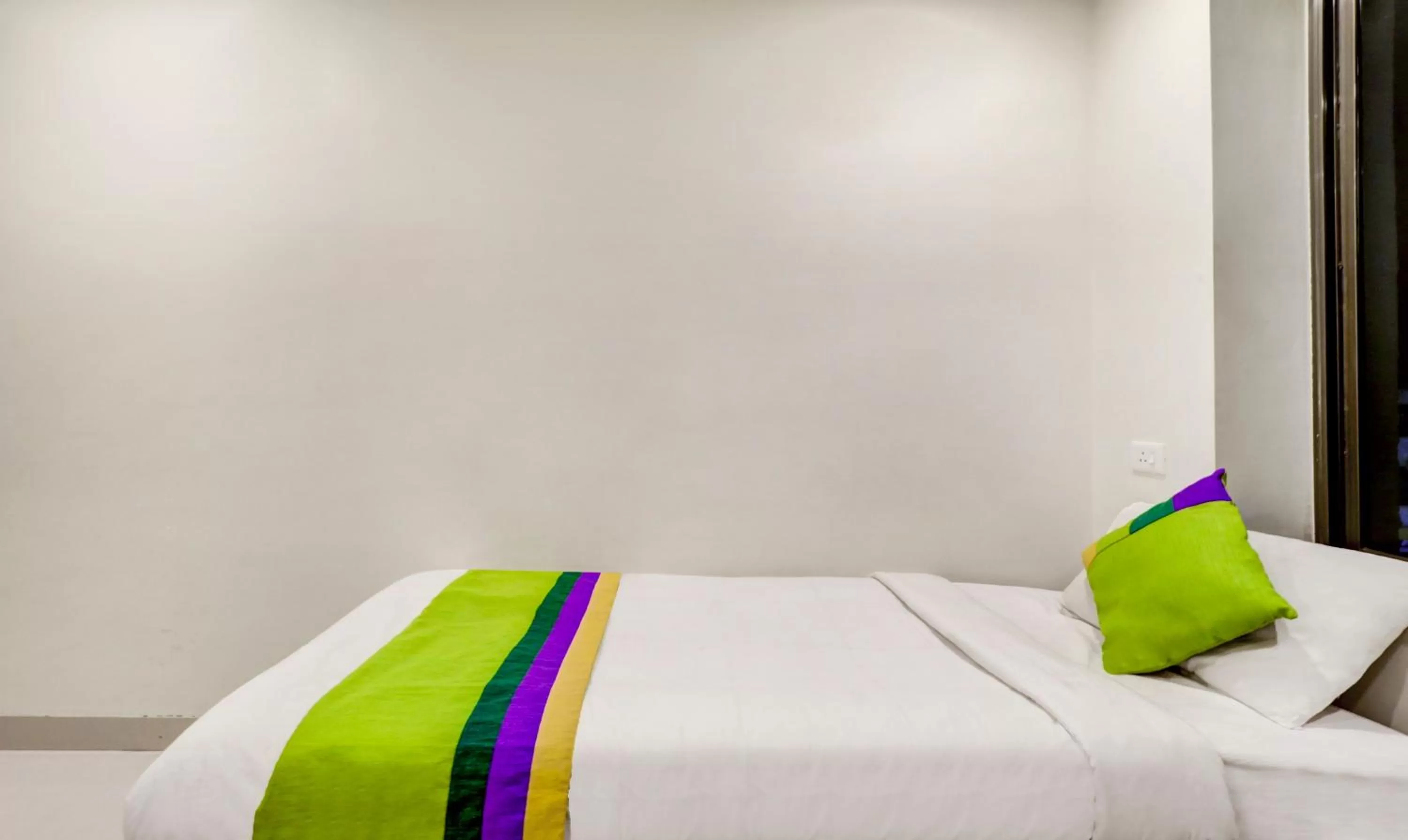 Bed in Treebo Trend Orange City