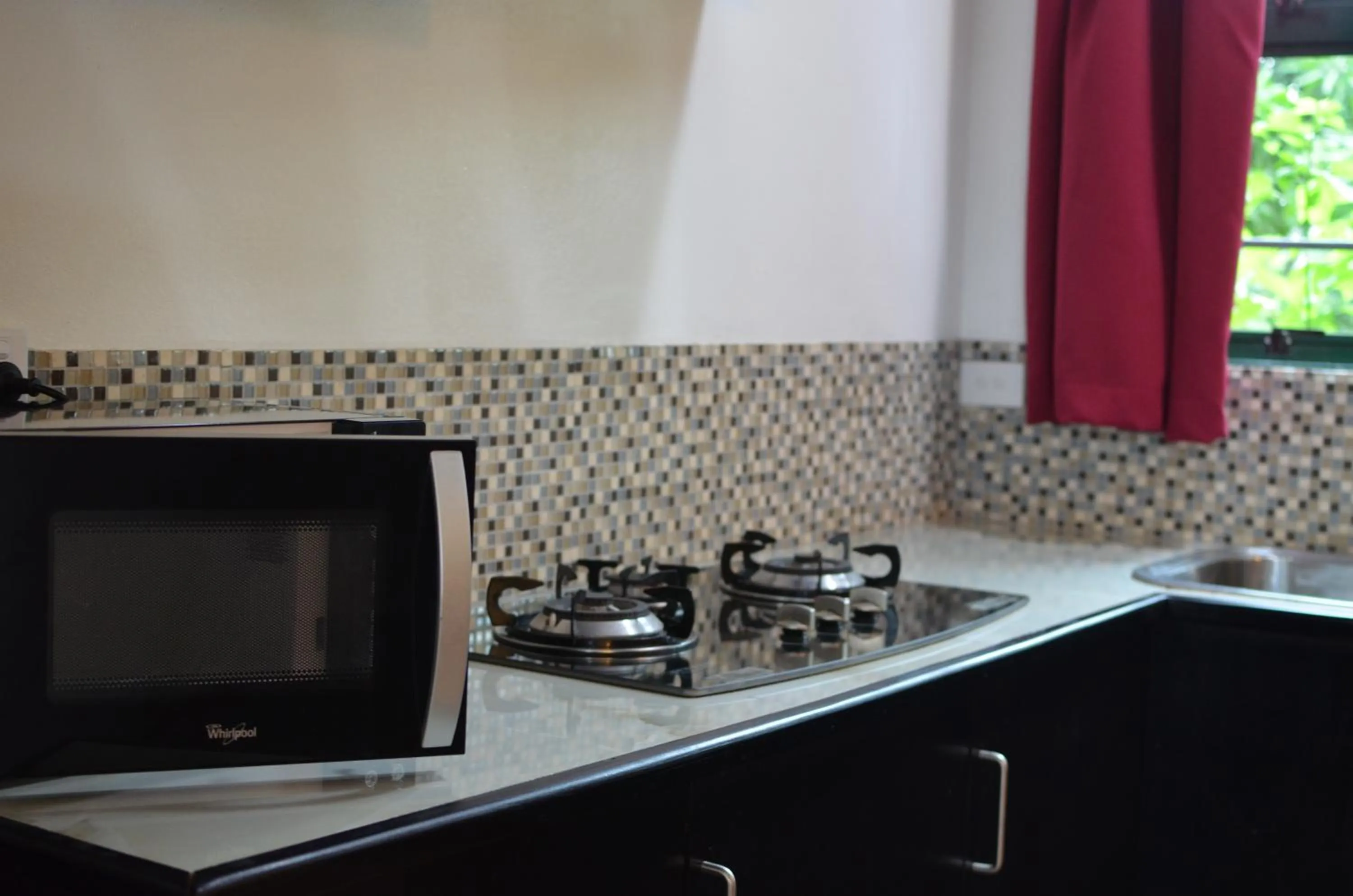 Kitchen or kitchenette in Grand West Villas