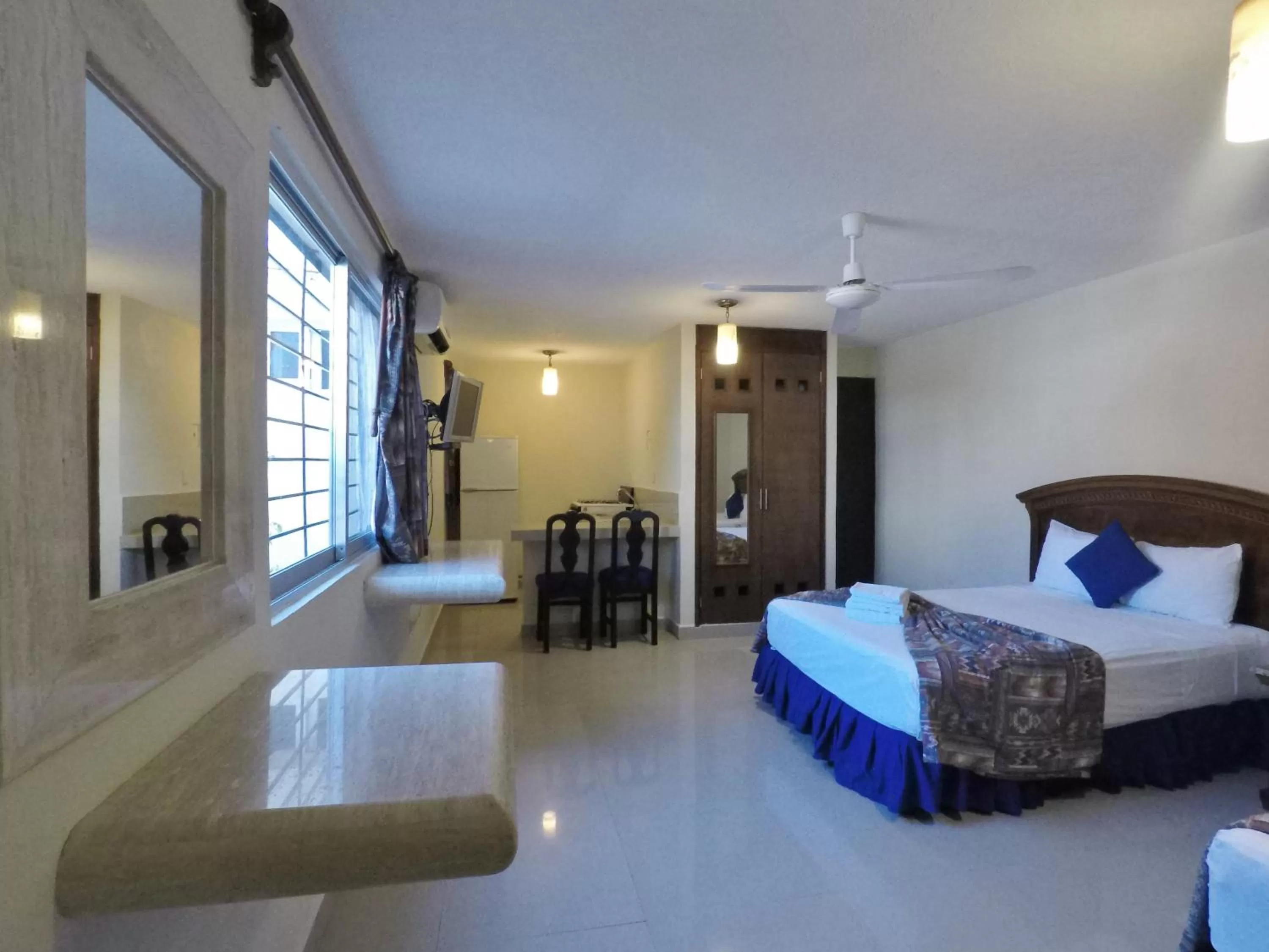 Photo of the whole room, Bed in Hotel El Campanario Playa del Carmen