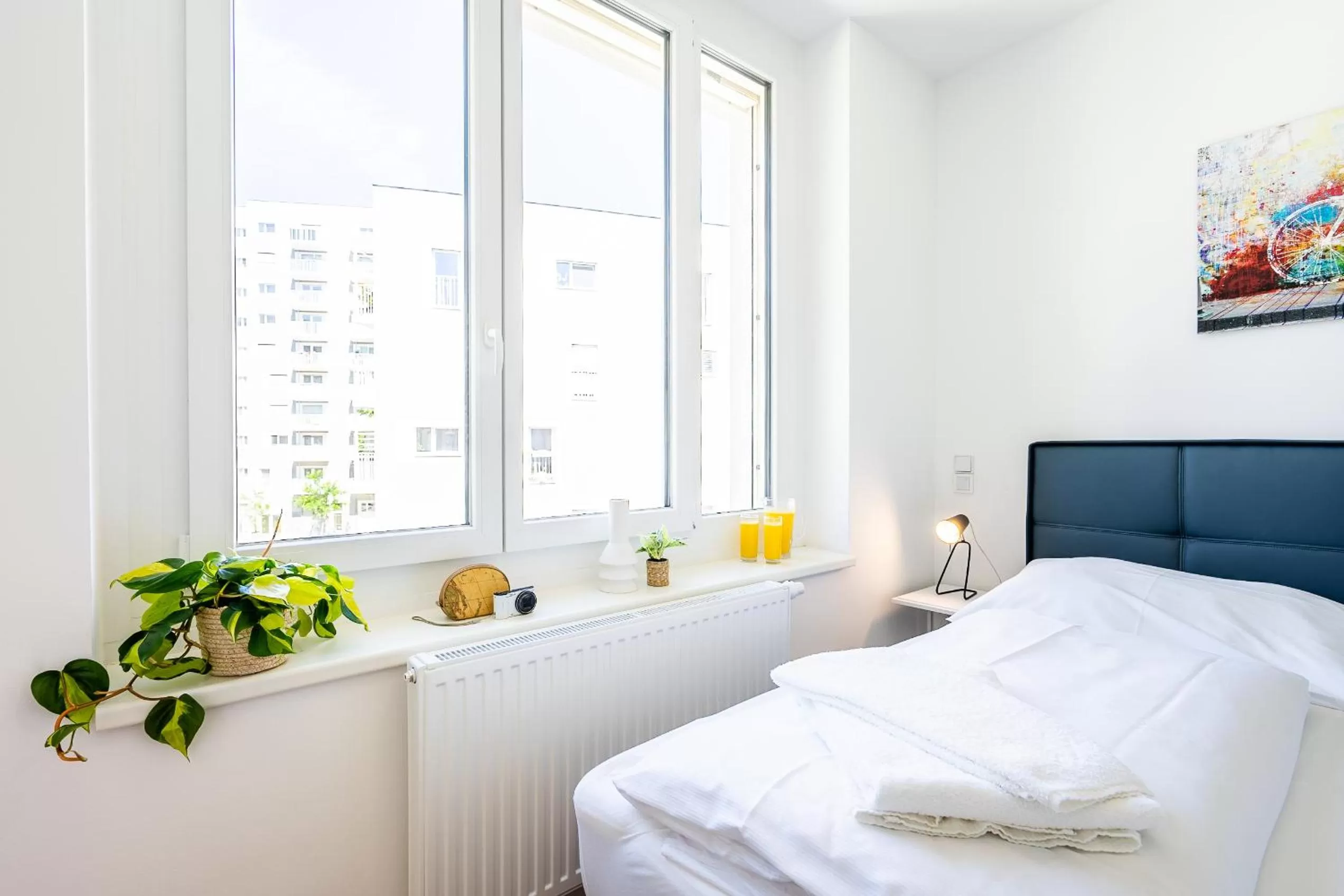 Bed in FeelGood Apartments SmartLiving | contactless check-in