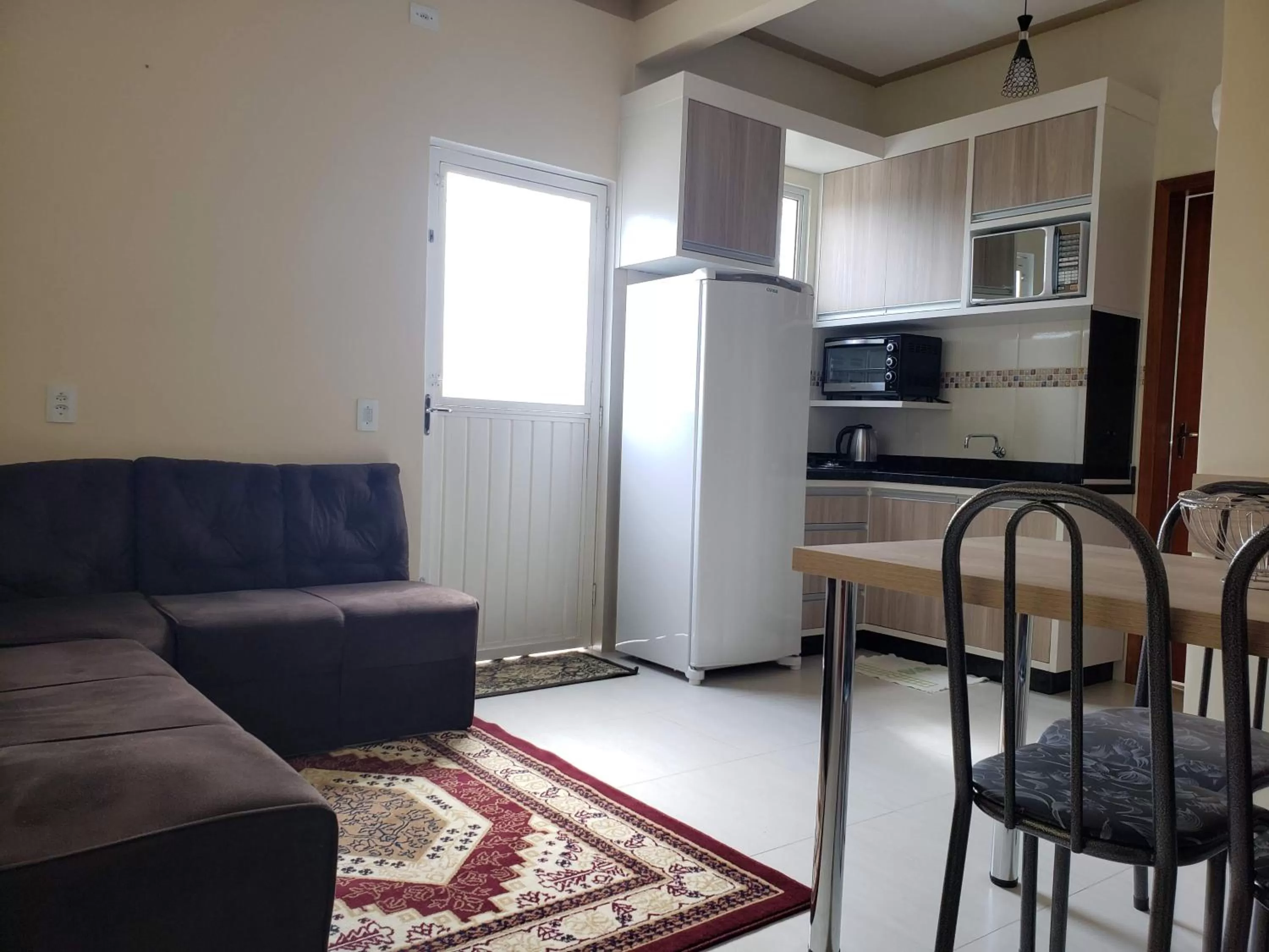 Communal kitchen in Felipe Family Houses - Casas de temporada