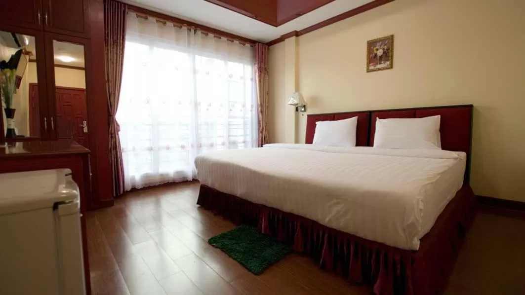 Bed in Bluebird Inn Pattaya