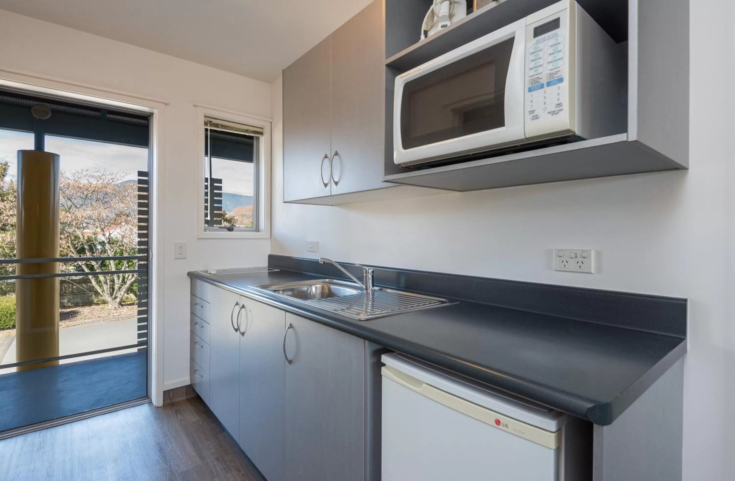 Kitchen or kitchenette in Greens Motel