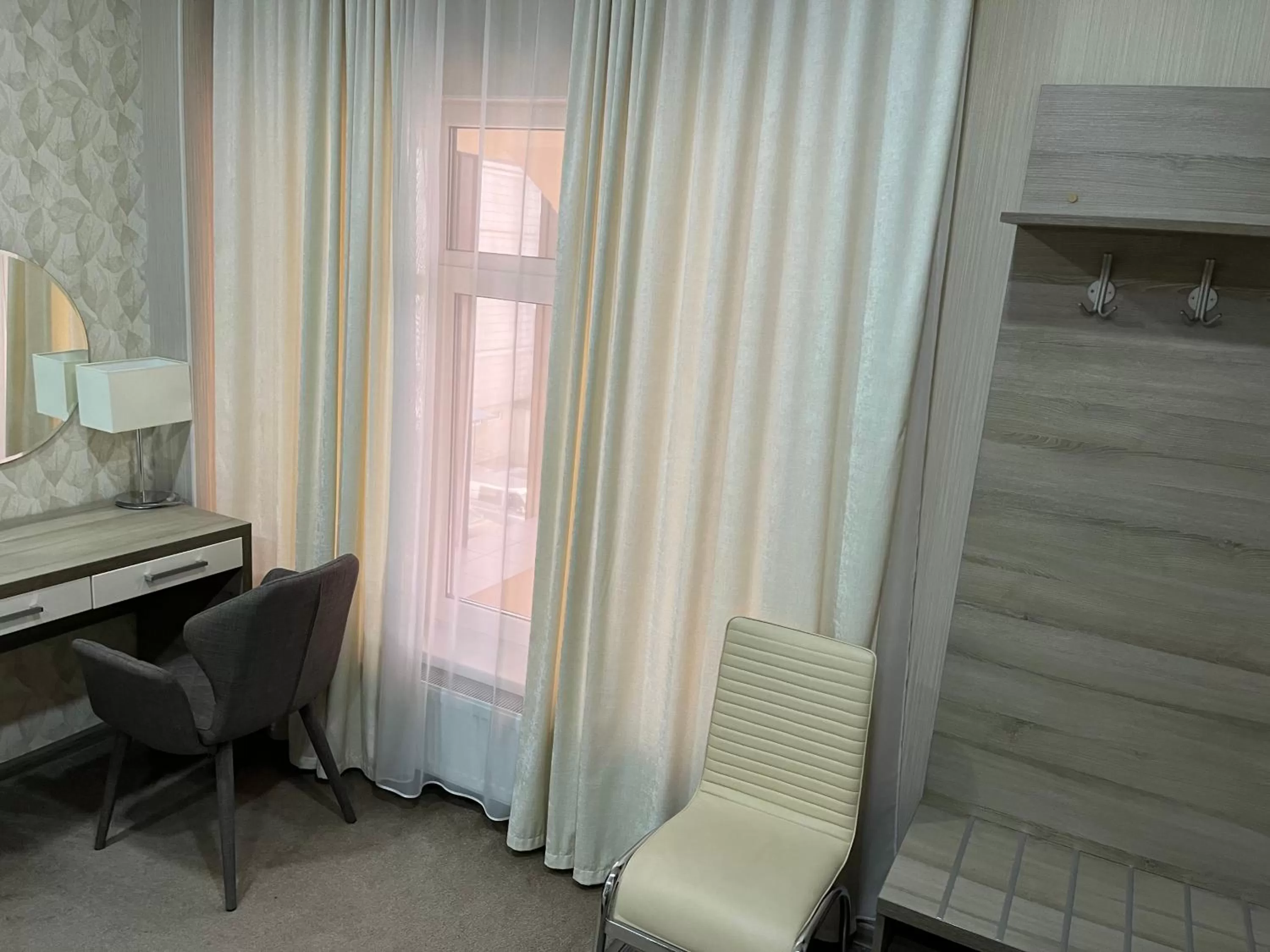 Communal lounge/ TV room, TV/Entertainment Center in Elite Hotel