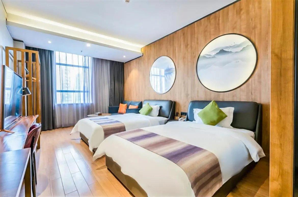 Bedroom in Guangzhou Nuomo International Hotel-Canton Fair Free Shuttle Bus