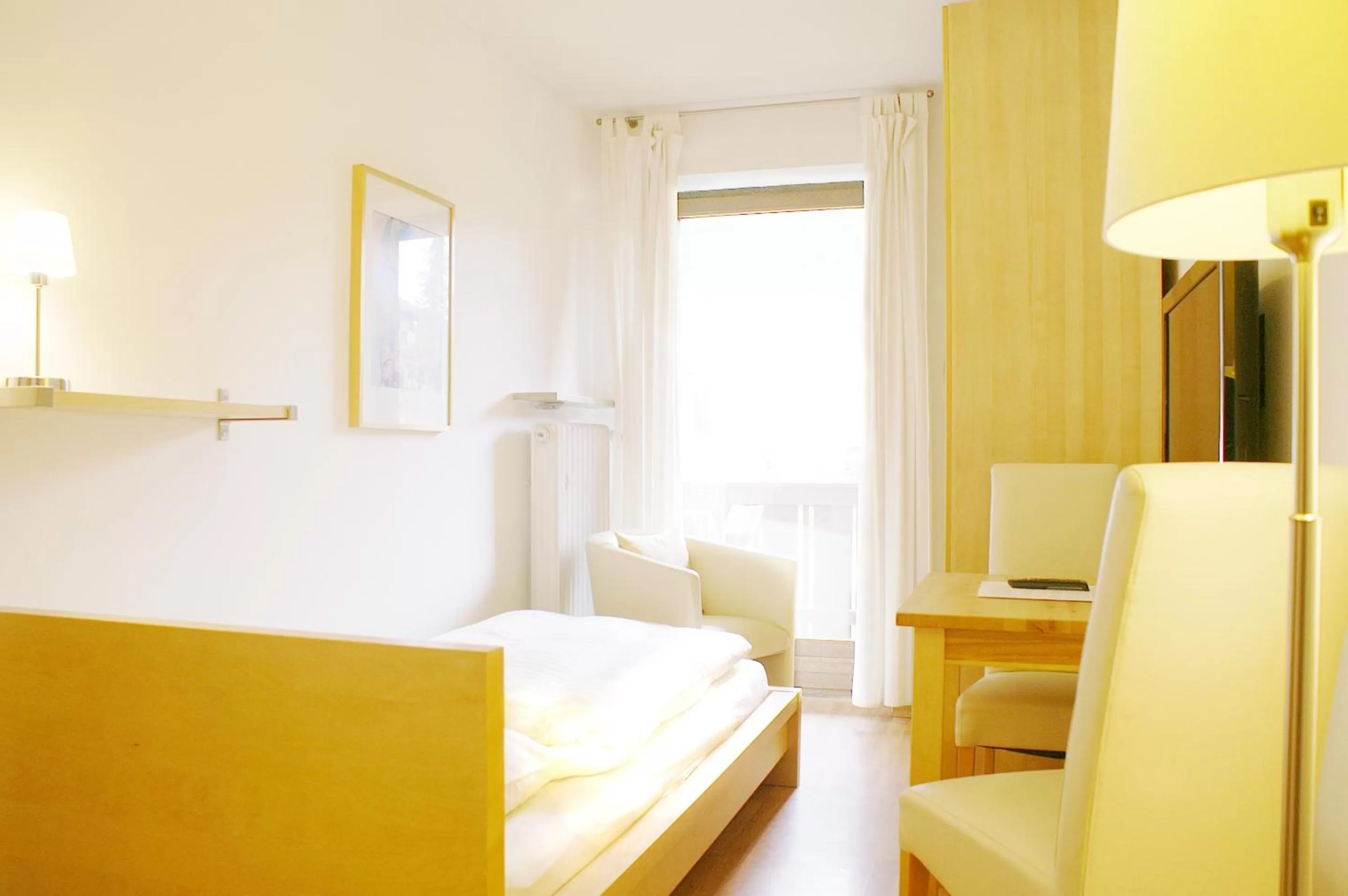 Bed, Seating Area in Hotel Garni Landhaus Sonnenstern