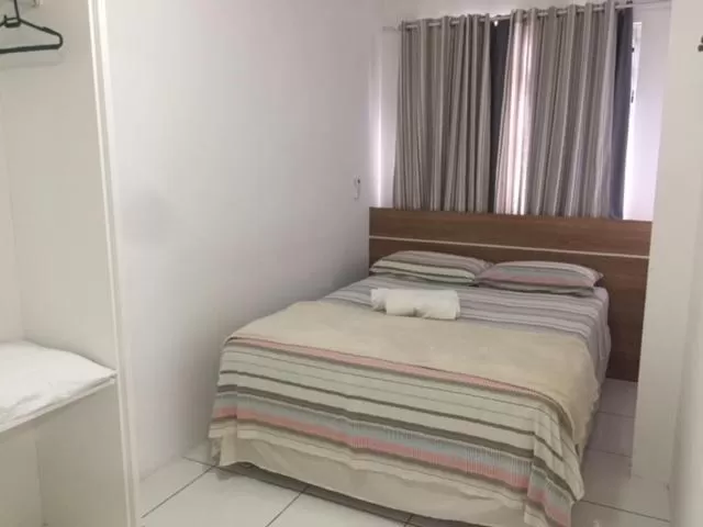 Bed in Pousada Almeida