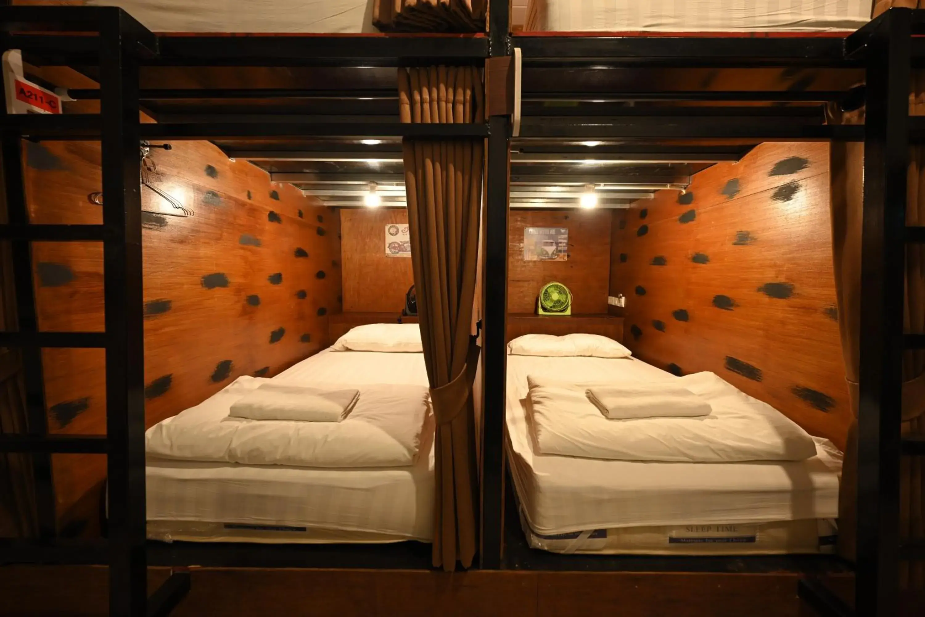 Dormitory Room for Female 8 Bunk Beds with Shared Bathroom in The 8 Factory Hotel Phitsanulok Dormitory Room for Female 8 Bunk Beds with Shared Bathroom in The 8 Factory Hotel Phitsanulok